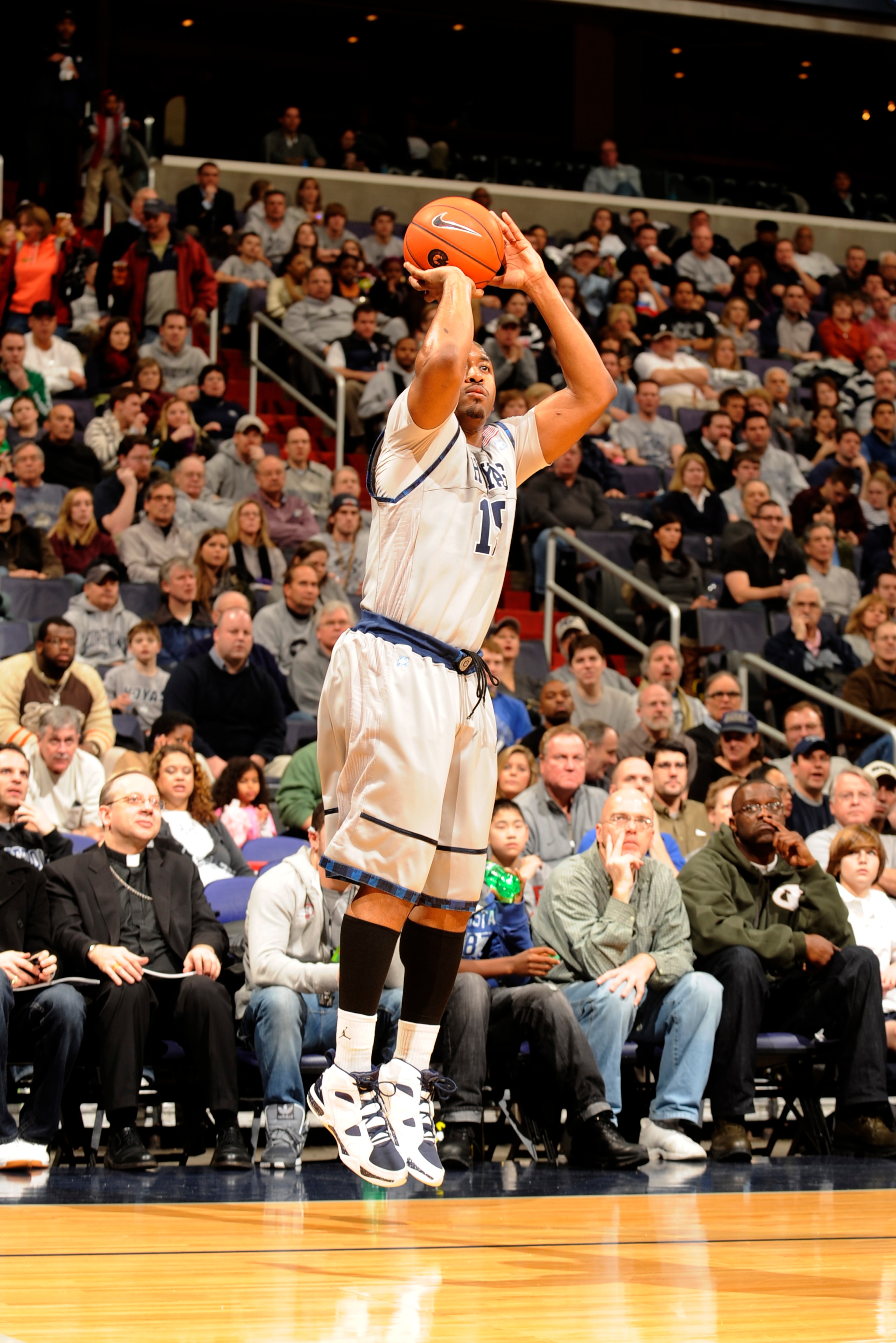 WASHINGTON, DC - FEBRUARY 5: Austin Freeman #15 of the Georgetown Hoyas takes a jump shot during a college basketball game against the Providence Friars on February 5, 2011 at the Verizon Center in Washington, DC. The Hoyas won 83-81. (Photo by Mitchel WASHINGTON, DC - FEBRUARY 5: Austin Freeman #15 of the Georgetown Hoyas takes a jump shot during a college basketball game against the Providence Friars on February 5, 2011 at the Verizon Center in Washington, DC. The Hoyas won 83-81. (Photo by Mitchel