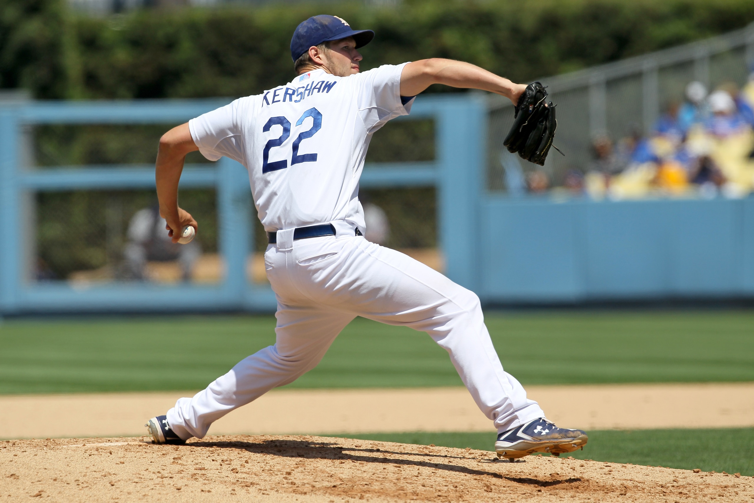 LOS ANGELES, CA - JULY 25:  Pitcher Clayton Kershw #22 of the Los Angeles Dodgers throws a pitch against the New York Mets on July 25, 2010 at Dodger Stadium in Los Angeles, California.   The Dodgers won 1-0.  (Photo by Stephen Dunn/Getty Images)