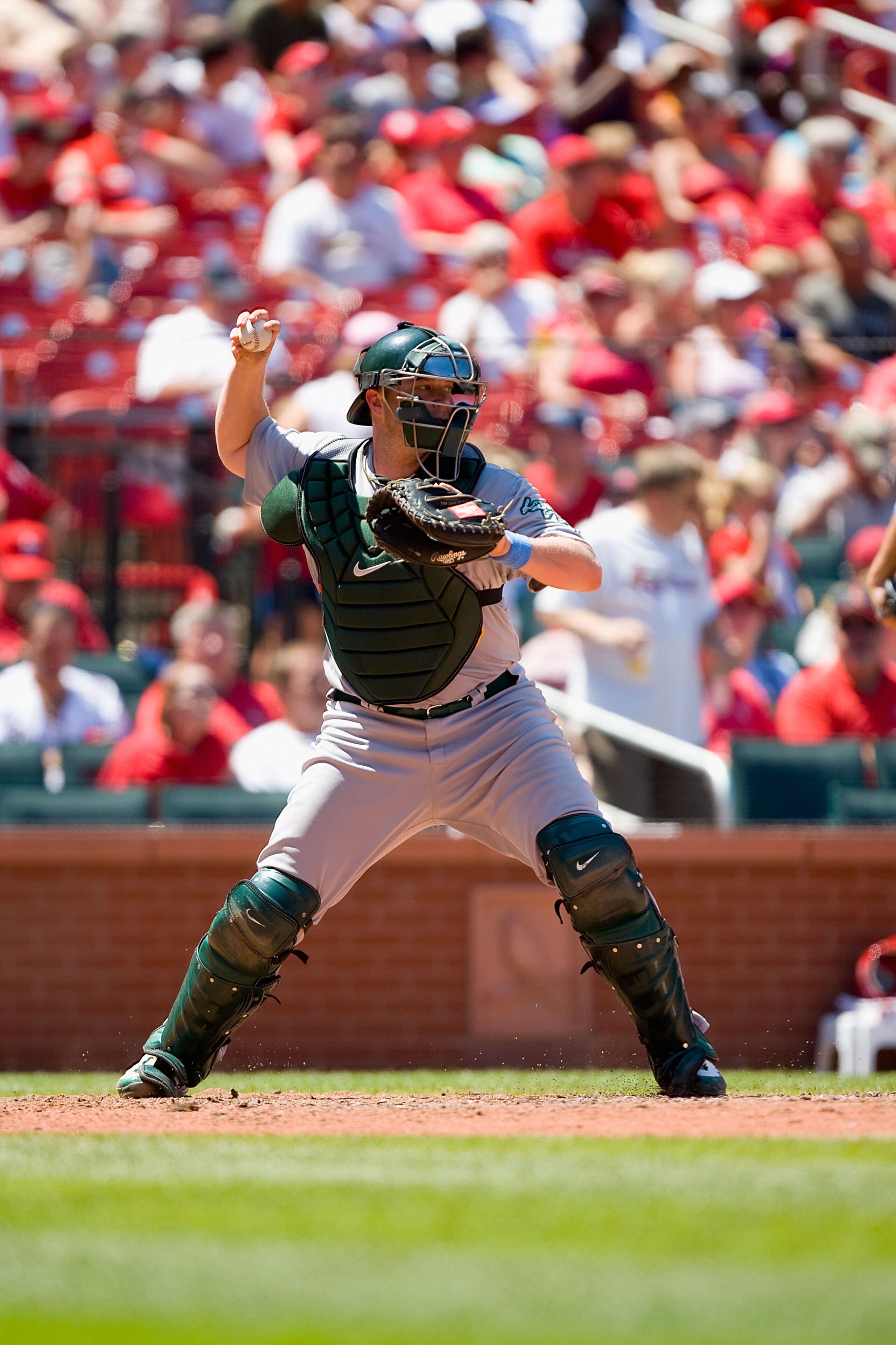 ST. LOUIS - JUNE 20: Landon Powell #35 of the Oakland Athletics throws to second base against the St. Louis Cardinals at Busch Stadium on June 20, 2010 in St. Louis, Missouri.  (Photo by Dilip Vishwanat/Getty Images)