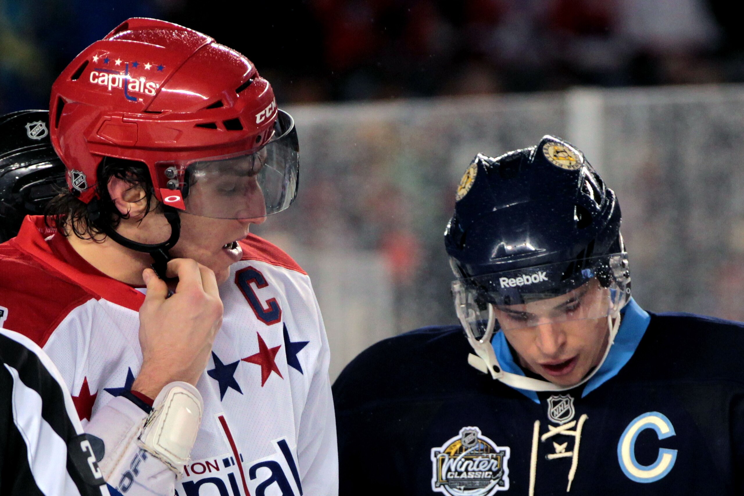 PITTSBURGH, PA - JANUARY 01:  Alex Ovechkin #8 of the Washington Capitals and Sidney Crosby #81 of the Pittsburgh Penguins are seen during the 2011 NHL Bridgestone Winter Classic at Heinz Field on January 1, 2011 in Pittsburgh, Pennsylvania. Washington wo