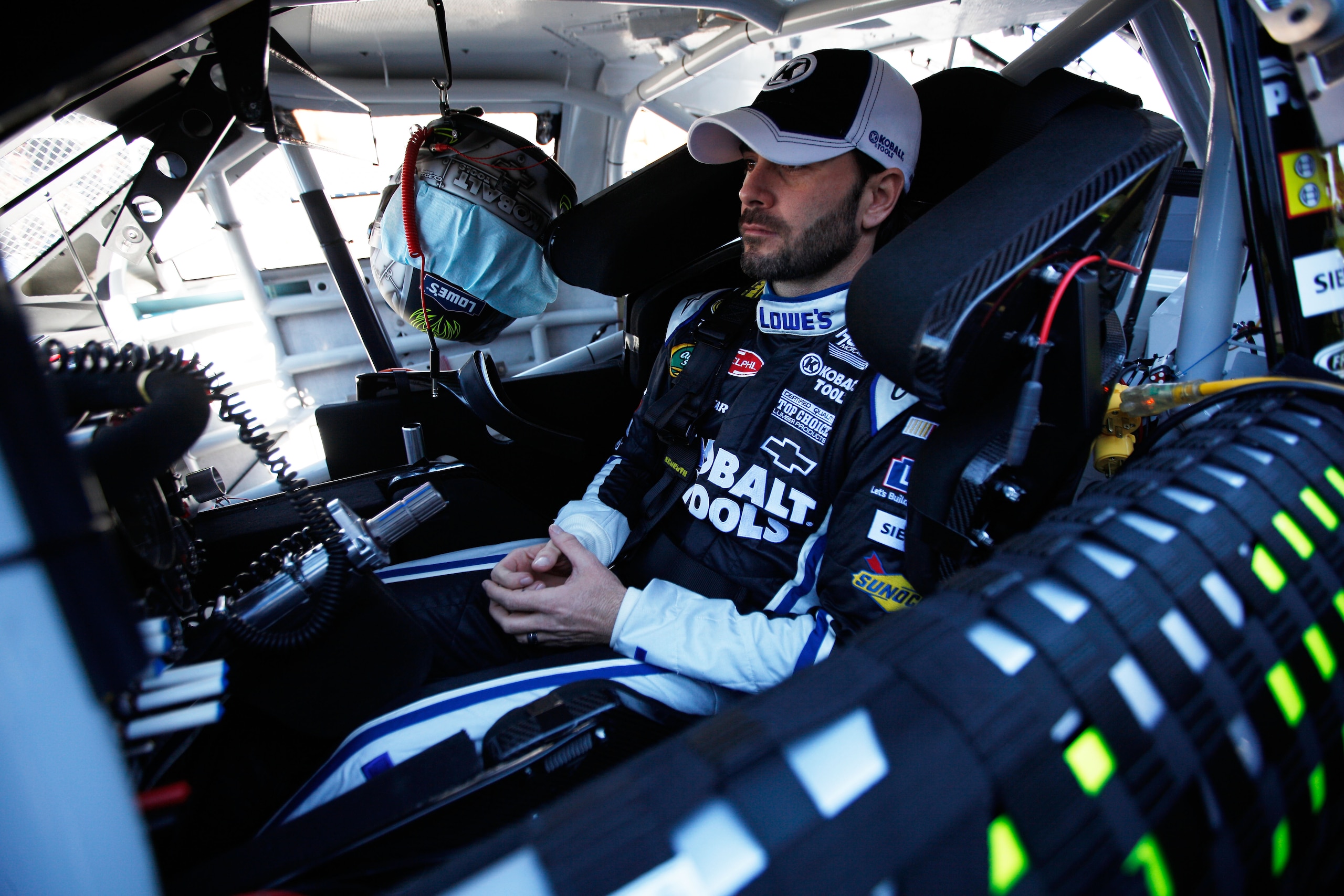 DAYTONA BEACH, FL - FEBRUARY 12: Jimmie Johnson, driver of the #48 Lowe's Chevrolet, sits in his car during practice for the NASCAR Sprint Cup Series Daytona 500 at Daytona International Speedway on February 12, 2011 in Daytona Beach, Florida. (Photo by DAYTONA BEACH, FL - FEBRUARY 12: Jimmie Johnson, driver of the #48 Lowe's Chevrolet, sits in his car during practice for the NASCAR Sprint Cup Series Daytona 500 at Daytona International Speedway on February 12, 2011 in Daytona Beach, Florida. (Photo by