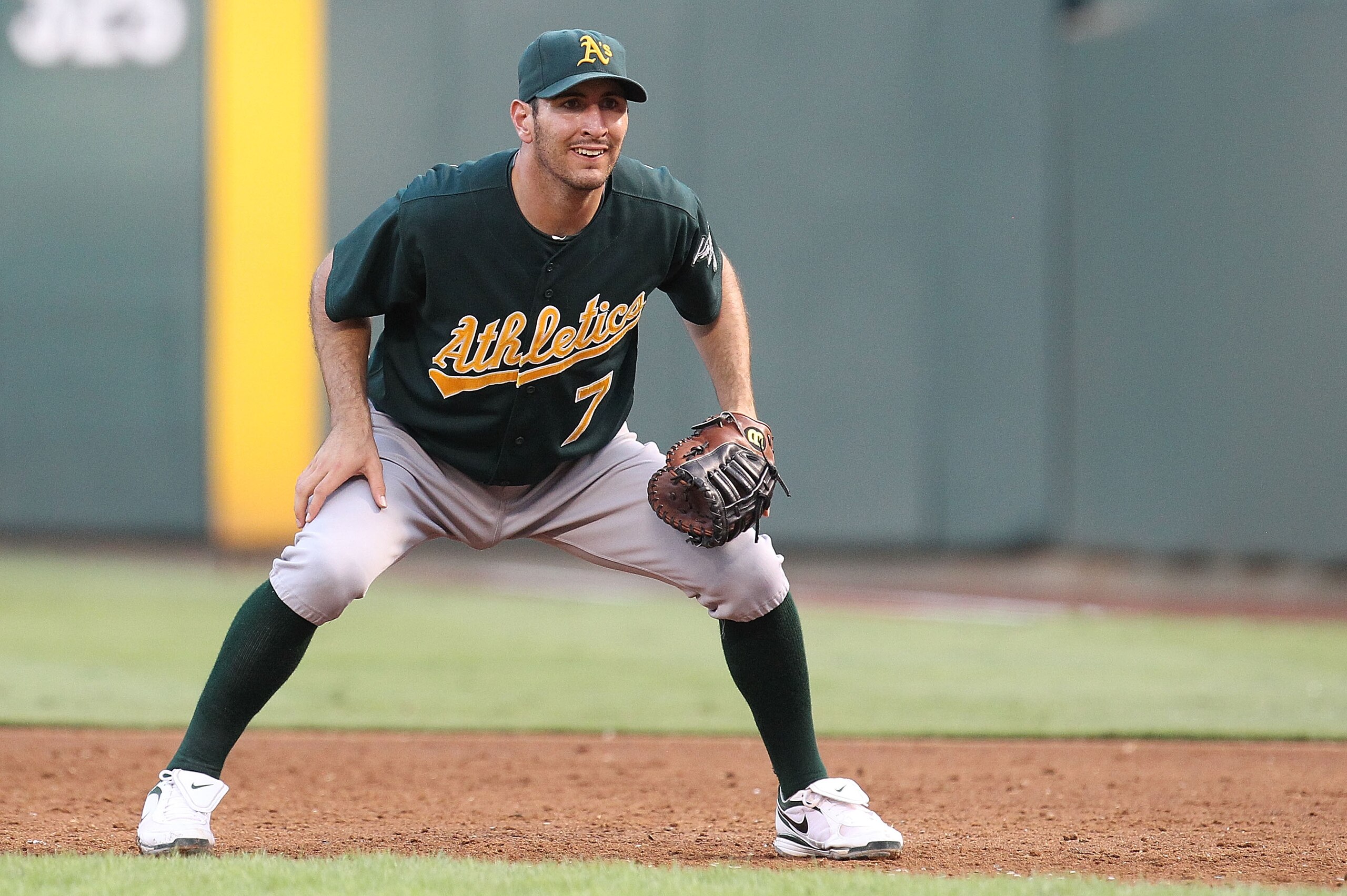 ARLINGTON, TX - JULY 29: First baseman Adam Rosales #7 of the Oakland Athletics on July 29, 2010 at Rangers Ballpark in Arlington, Texas.  (Photo by Ronald Martinez/Getty Images)