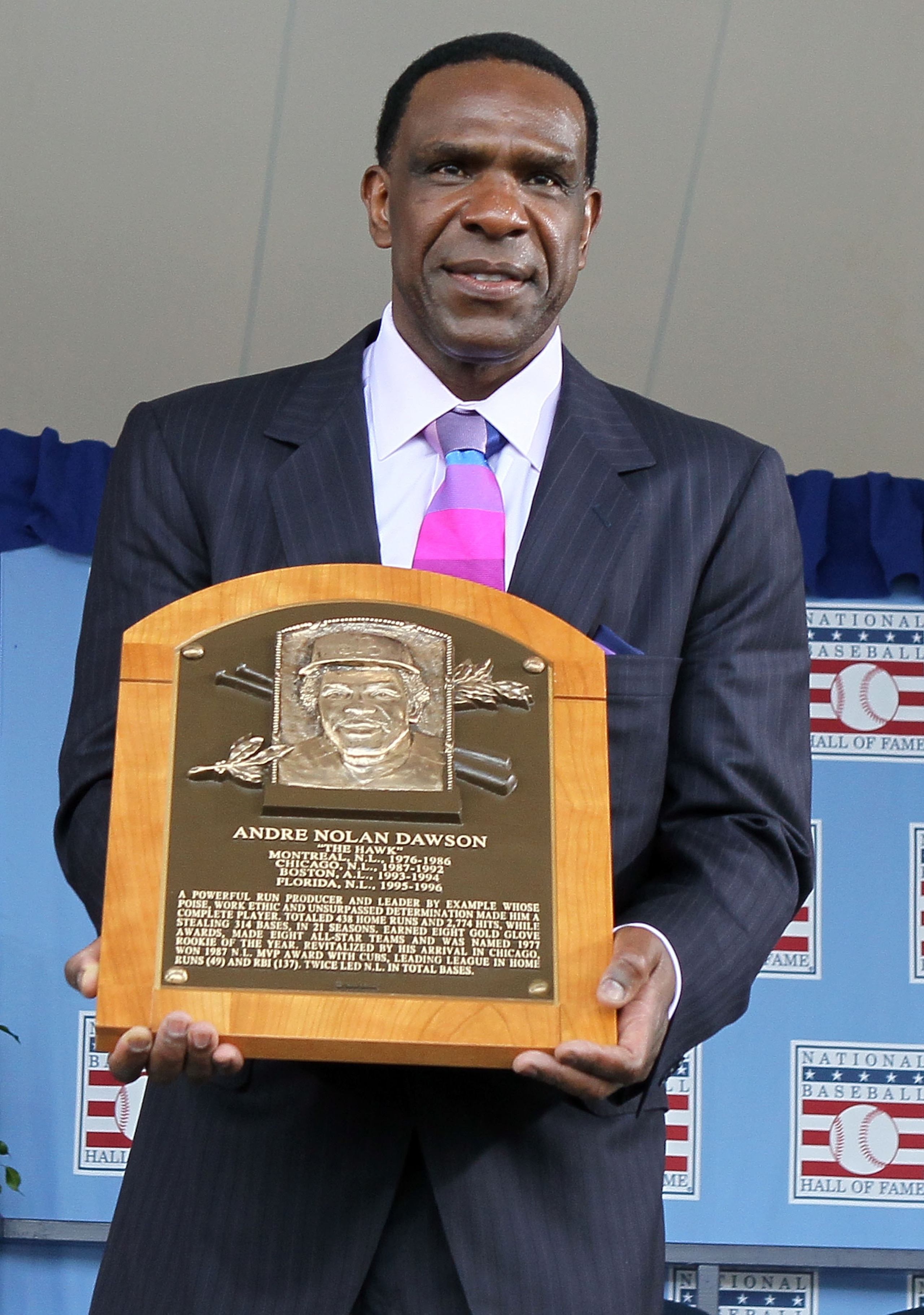 COOPERSTOWN, NY - JULY 25: 2010 inductee Andre Dawson poses for a photograph with his plaque at Clark Sports Center during the Baseball Hall of Fame induction ceremony on July 25, 20010 in Cooperstown, New York. Dawson was an eight time all-star during h COOPERSTOWN, NY - JULY 25: 2010 inductee Andre Dawson poses for a photograph with his plaque at Clark Sports Center during the Baseball Hall of Fame induction ceremony on July 25, 20010 in Cooperstown, New York. Dawson was an eight time all-star during h
