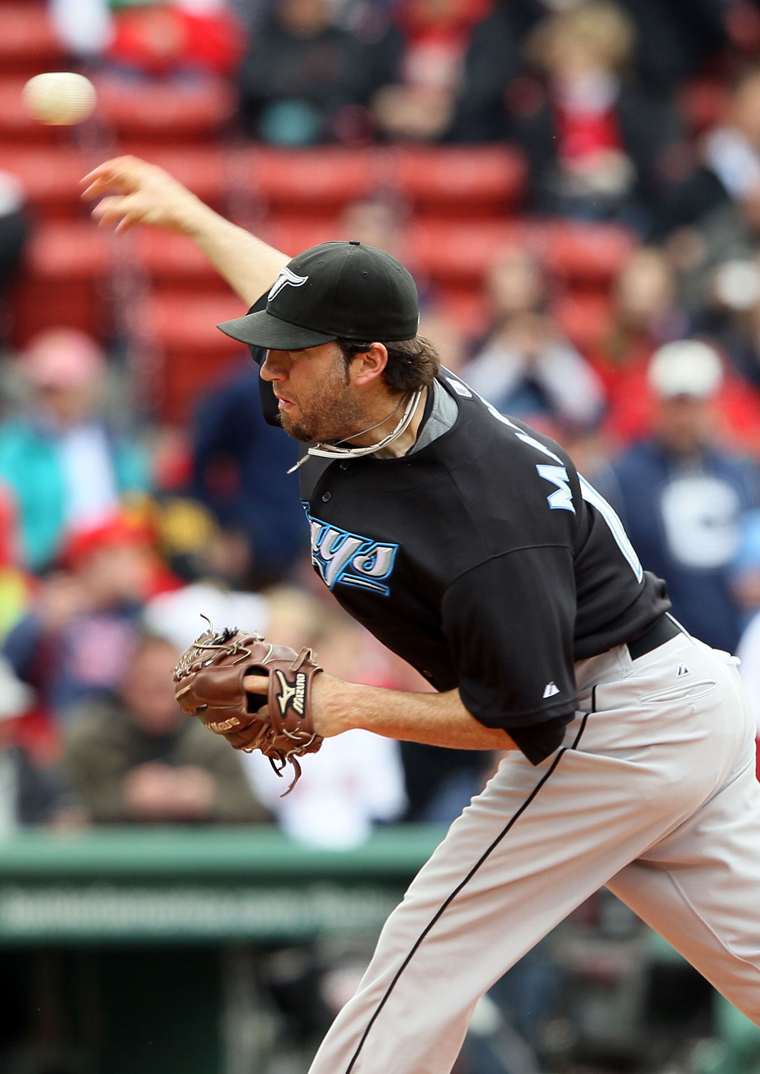 BOSTON - MAY 12:  Shaun Marcum #28 of the Toronto Blue Jays delivers a pitch in the first inning against the Boston Red Sox on May 12, 2010 at Fenway Park in Boston, Massachusetts.  (Photo by Elsa/Getty Images)