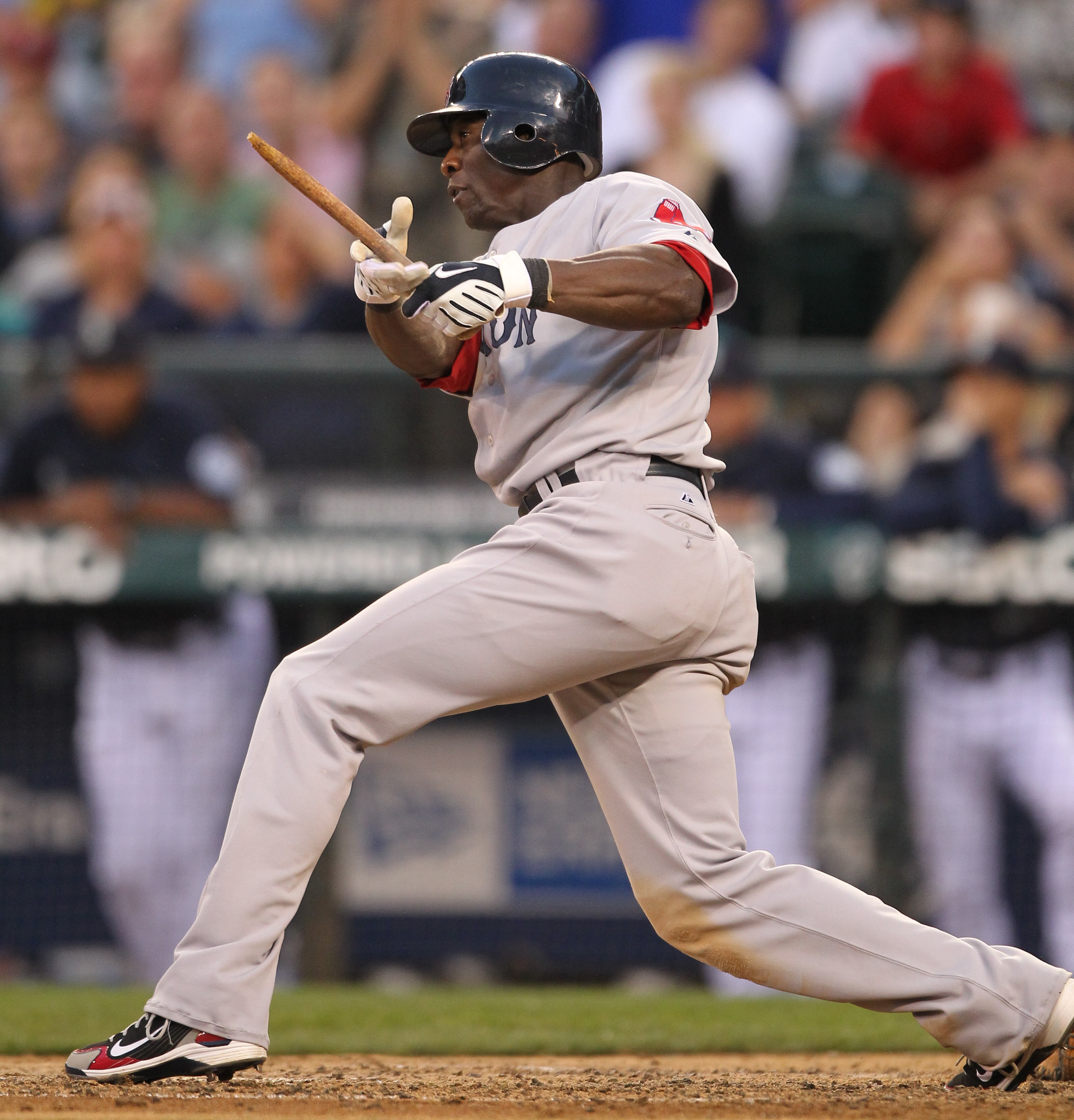 SEATTLE - JULY 23: Mike Cameron #23 of the Boston Red Sox breaks his bat against the Seattle Mariners at Safeco Field on July 23, 2010 in Seattle, Washington. (Photo by Otto Greule Jr/Getty Images)