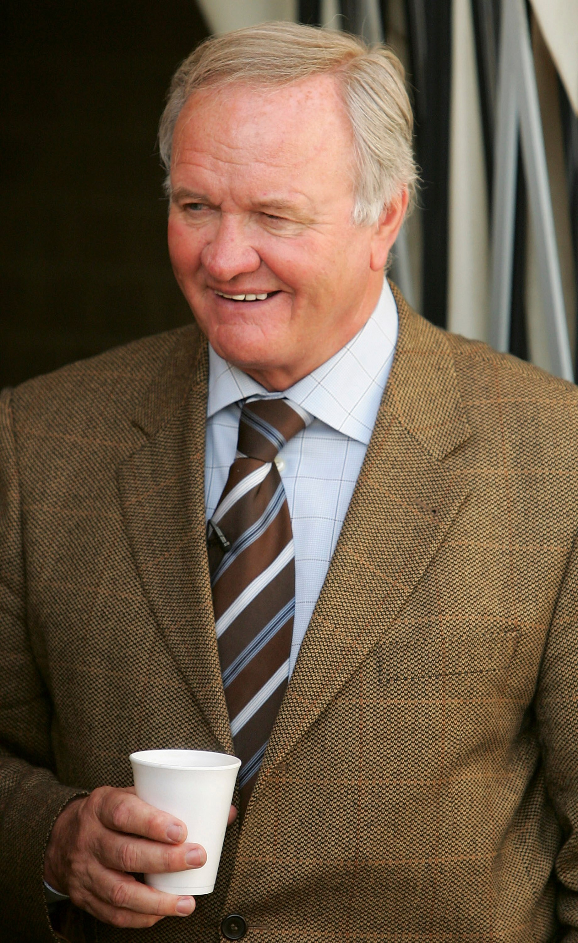 KETTERING, UNITED KINGDOM - JANUARY 27:  New Director of Football at Kettering, Ron Atkinson looks on before the Nationwide Conference North match between Kettering Town and Droylsden at Rockingham Road on January 27, 2007 in Kettering, England.  (Photo b