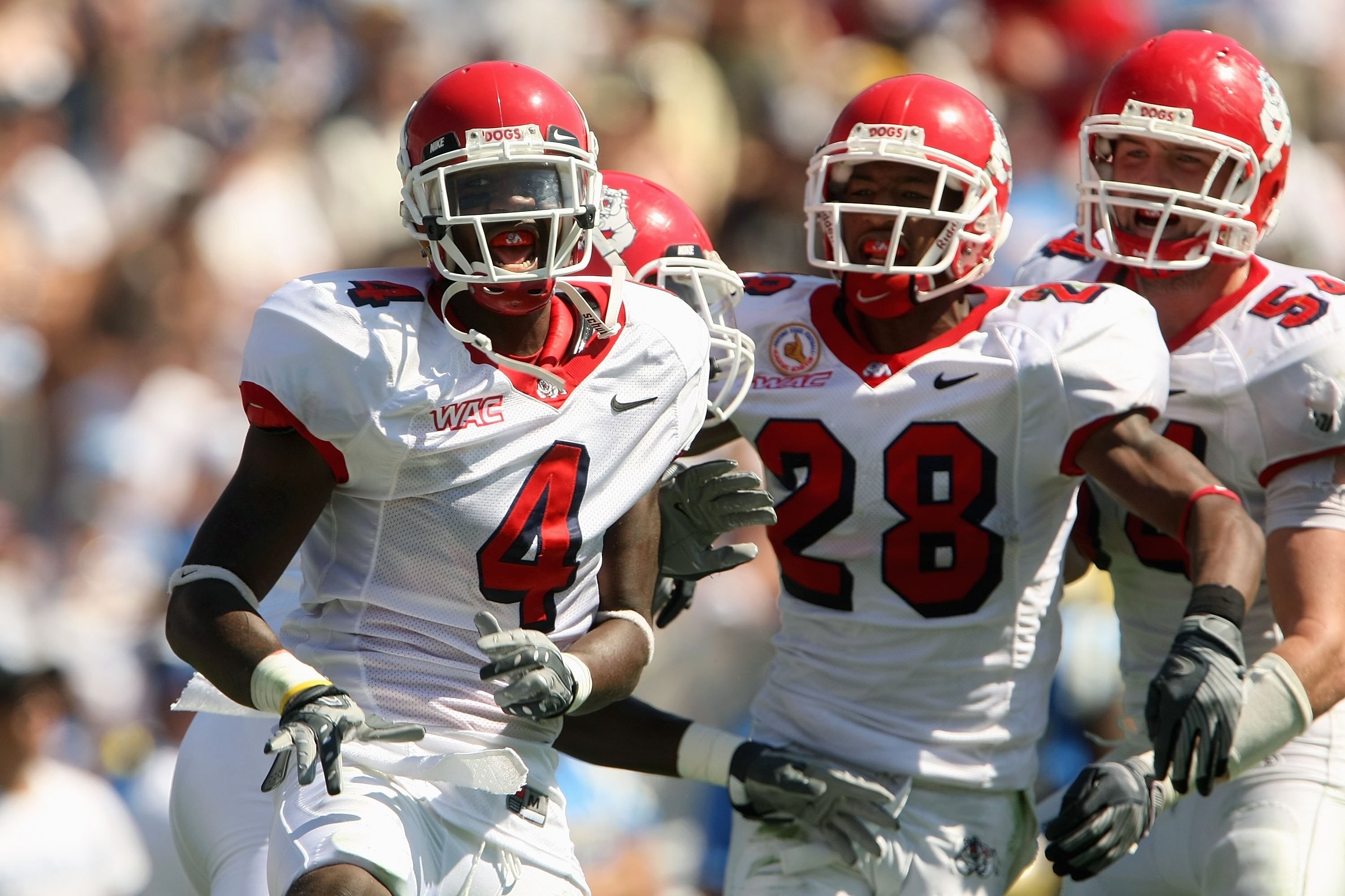 PASADENA, CA - SEPTEMBER 27:  Damion Owens #4, A.J. Jefferson #28 and Ben Jacobs #54 of the Frenso State Bulldogs celebrates a defensive play against the UCLA Bruins during the game on September 27, 2008 at the Rose Bowl in Pasadena, California.  (Photo b
