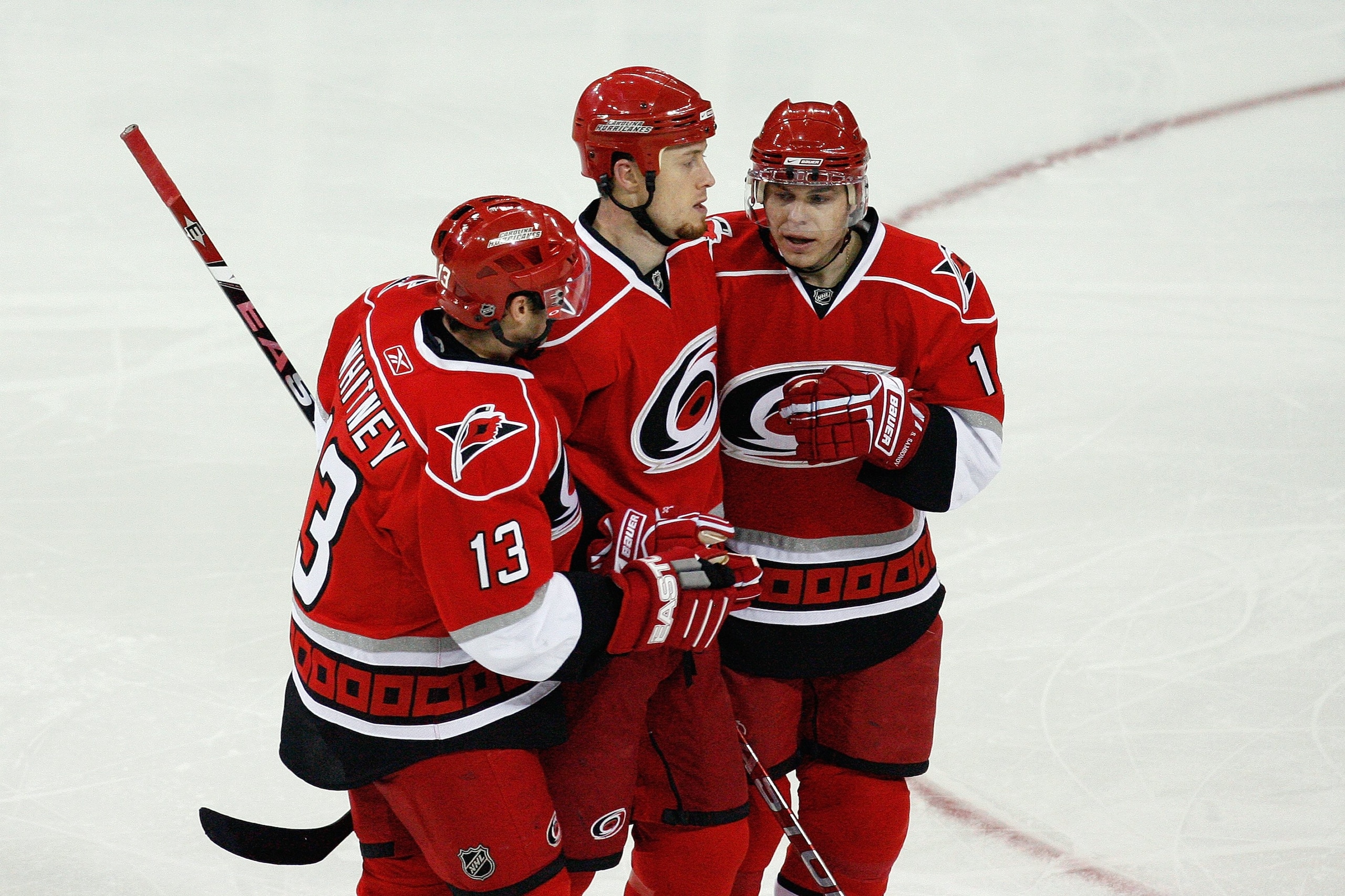 RALEIGH, NC - FEBRUARY 20:  Ray Whitney #13, Joe Corvo #77 and Sergei Samsonov #14 of the Carolina Hurricanes celebrate during the game against the Tampa Bay Lightning on February 20, 2009 at RBC Center in Raleigh, North Carolina.  (Photo by Kevin C. Cox/