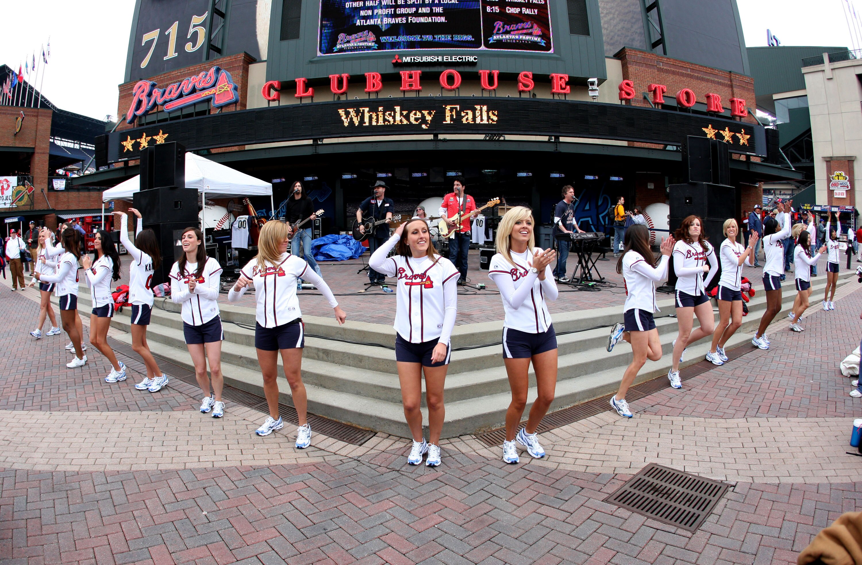 ATLANTA - MARCH 31: The Braves cheerleaders dance to the music of the band Whiskey Falls in the outfield pavilion before the game between the Atlanta Braves and the Pittsburgh Pirates at Turner Field March 31, 2008 in Atlanta, Georgia.  The Pirates beat t