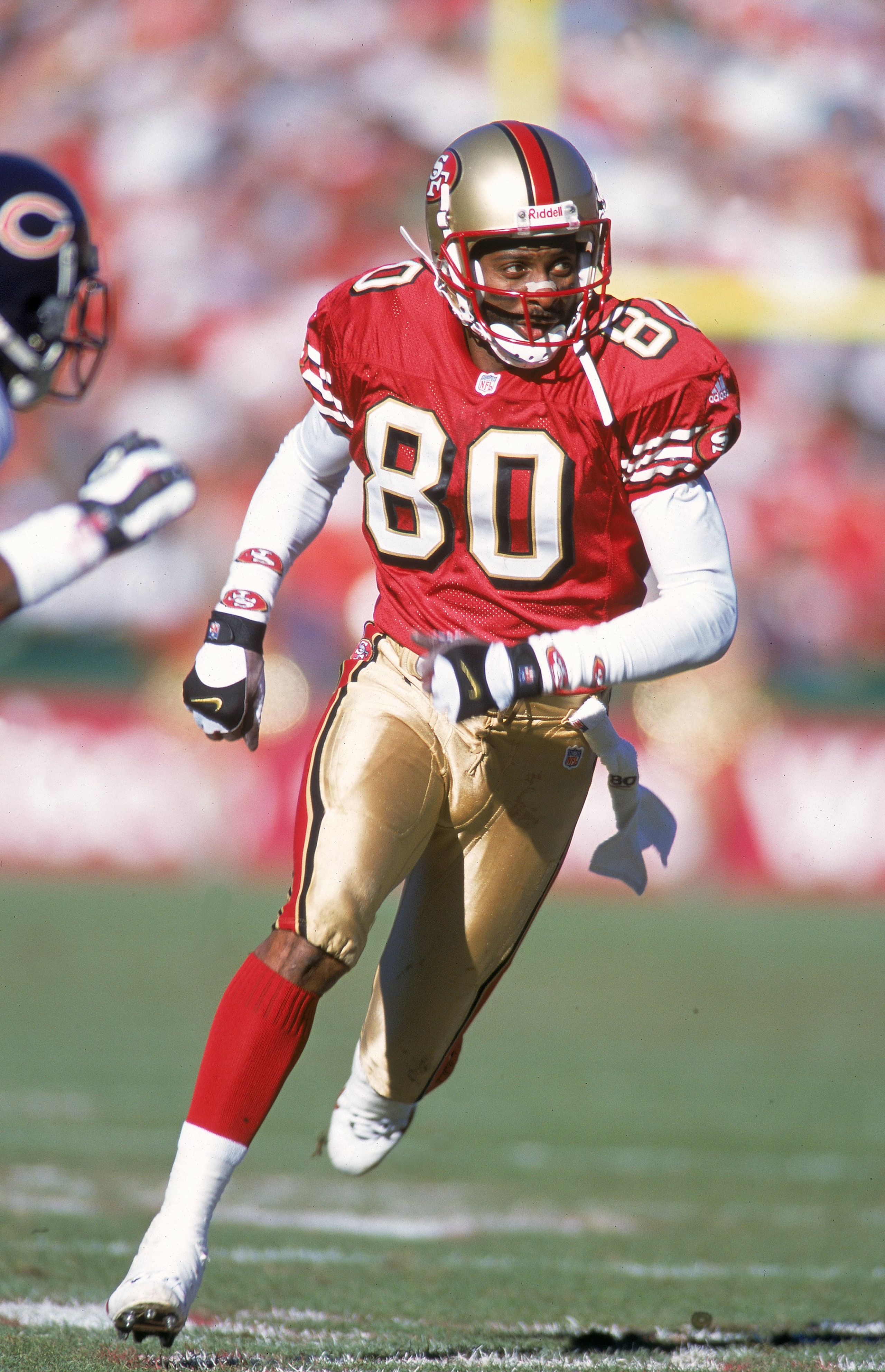 17 Dec 2000:  Jerry Rice #80 of the San Francisco 49ers looks to the side while running during the game against the Chicago Bears at the 3Com Park in San Francisco, California. The 49ers defeated the Bears 17-0.Mandatory Credit: Jed Jacobsohn  /Allsport