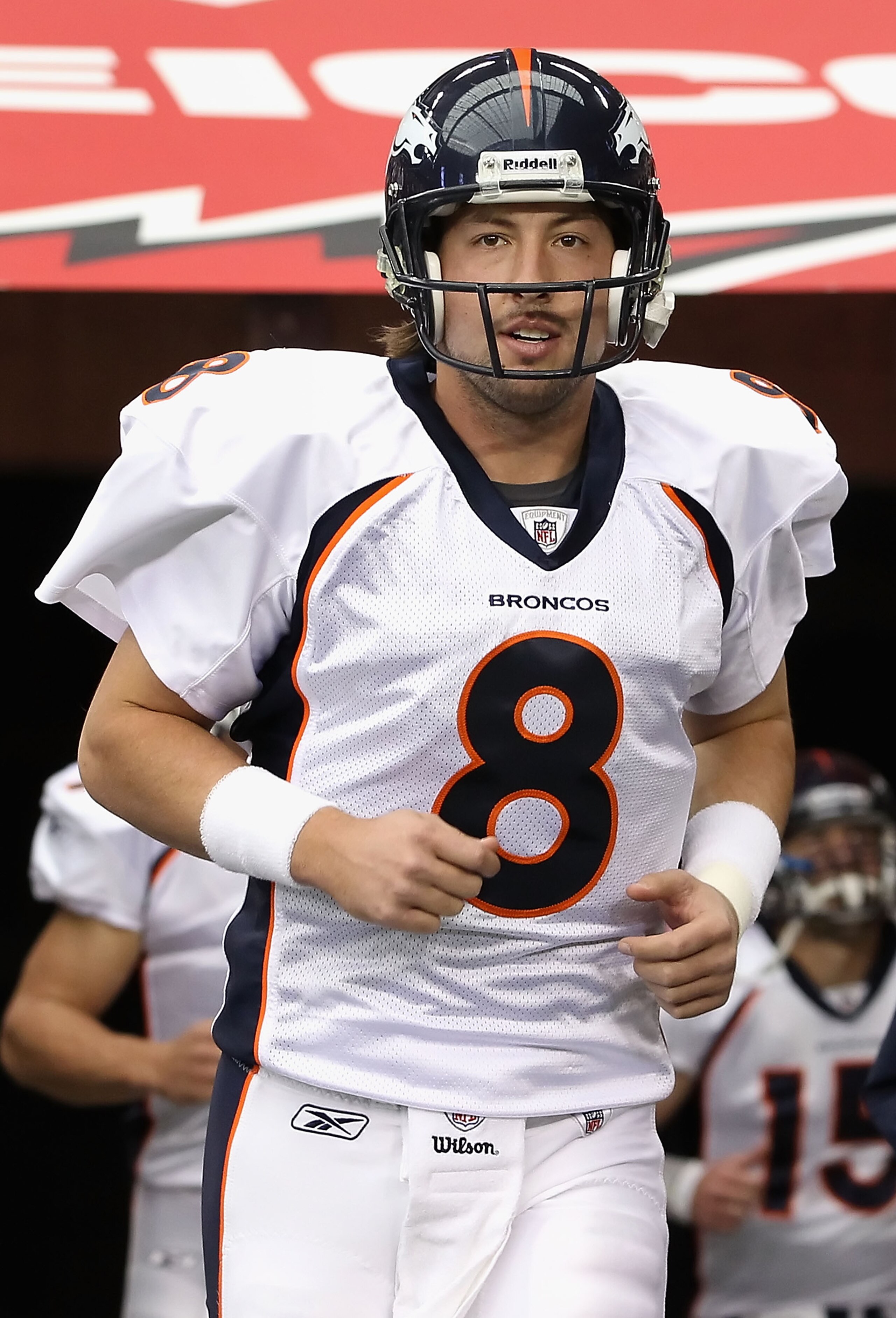 GLENDALE, AZ - DECEMBER 12:  Quarterback Kyle Orton #8 of the Denver Broncos runs out onto the field before the NFL game against the Arizona Cardinals at the University of Phoenix Stadium on December 12, 2010 in Glendale, Arizona.  (Photo by Christian Pet