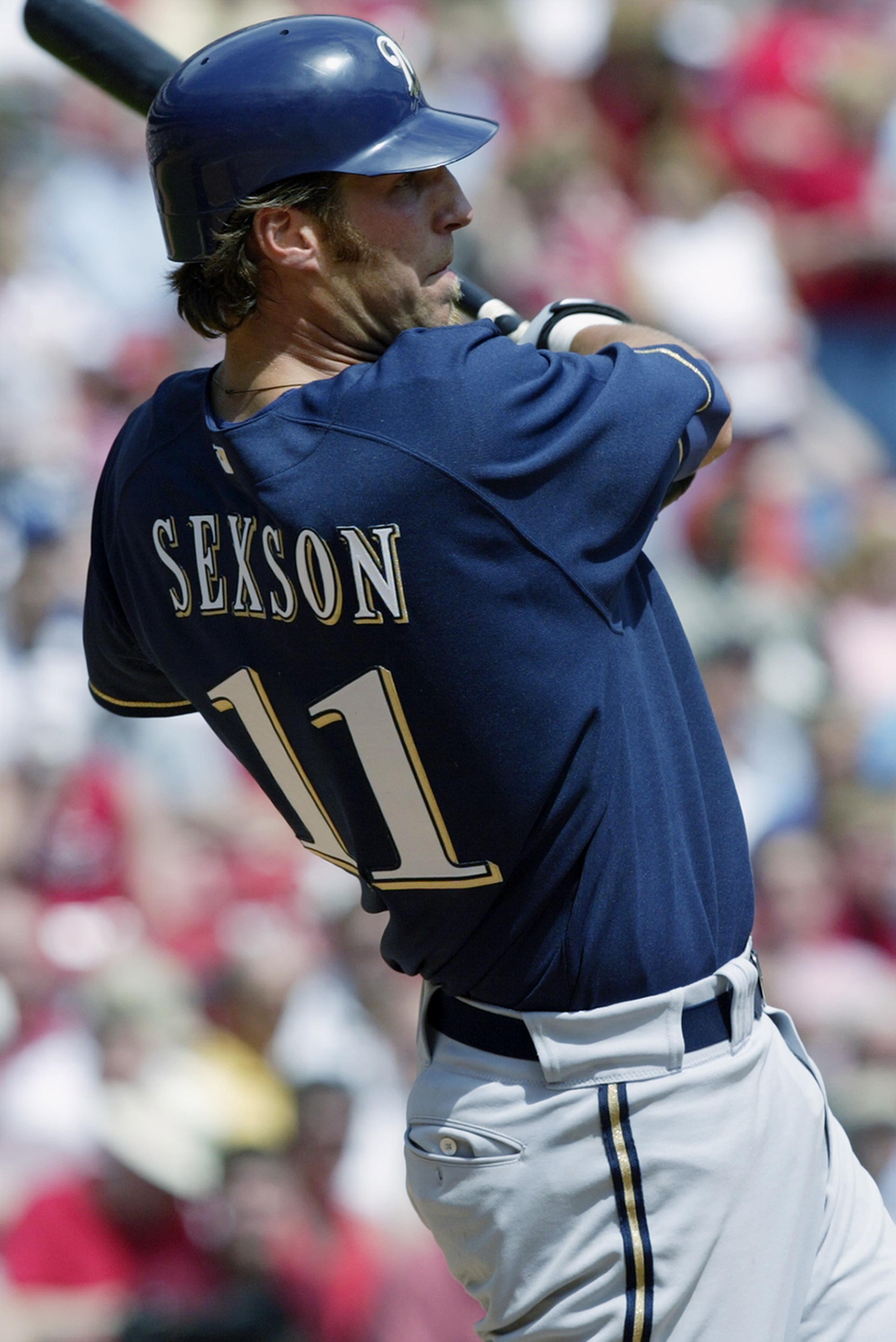 ST. LOUIS - APRIL 3:  First baseman Richie Sexson #11 of the Milwaukee Brewers follows through on his swing during the game against the St. Louis Cardinals at Busch Stadium on April 3, 2003 in St. Louis, Missouri. The Cardinals won 6-4. (Photo by Elsa/Get