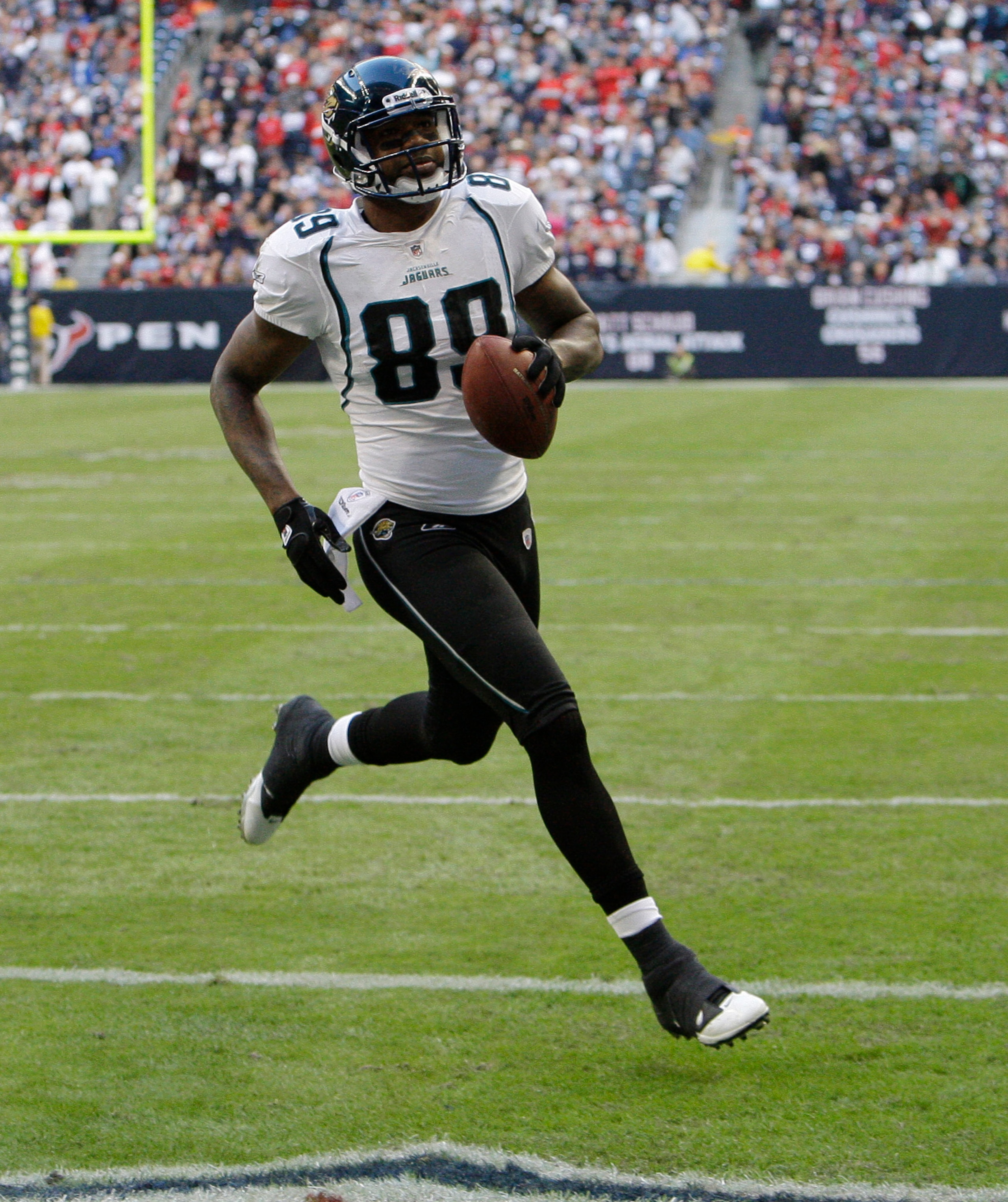 HOUSTON - JANUARY 02: Wide receiver Mike Thomas #80 of the Jacksonville Jaguars scores in the second quarter against the Houston Texans at Reliant Stadium on January 2, 2011 in Houston, Texas. (Photo by Bob Levey/Getty Images) HOUSTON - JANUARY 02: Wide receiver Mike Thomas #80 of the Jacksonville Jaguars scores in the second quarter against the Houston Texans at Reliant Stadium on January 2, 2011 in Houston, Texas. (Photo by Bob Levey/Getty Images)