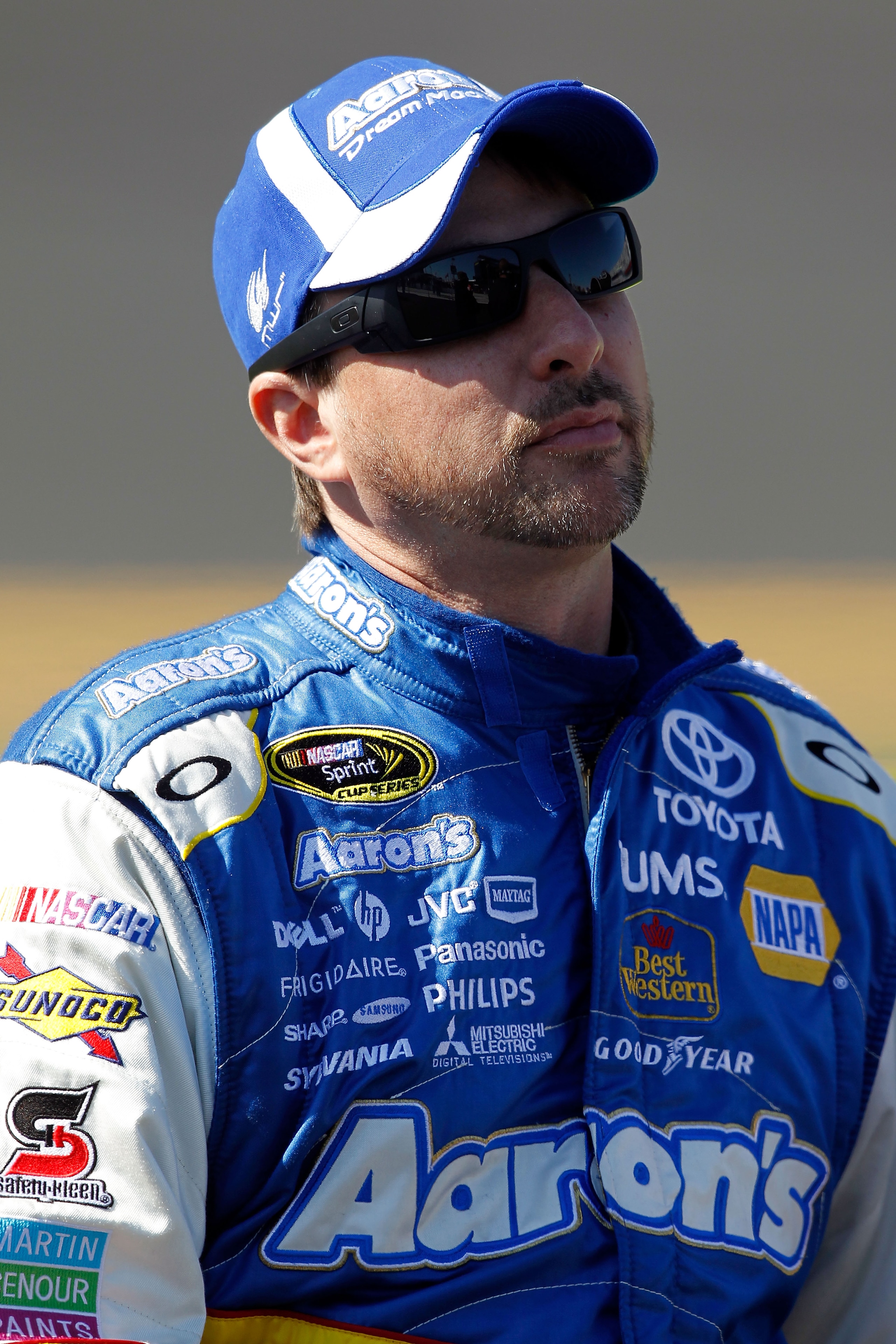 DAYTONA BEACH, FL - FEBRUARY 13:  David Reutimann, driver of the #00 Aaron's Dream Machine Toyota, looks on during qualifying for the NASCAR Sprint Cup Series Daytona 500 at Daytona International Speedway on February 13, 2011 in Daytona Beach, Florida.  (