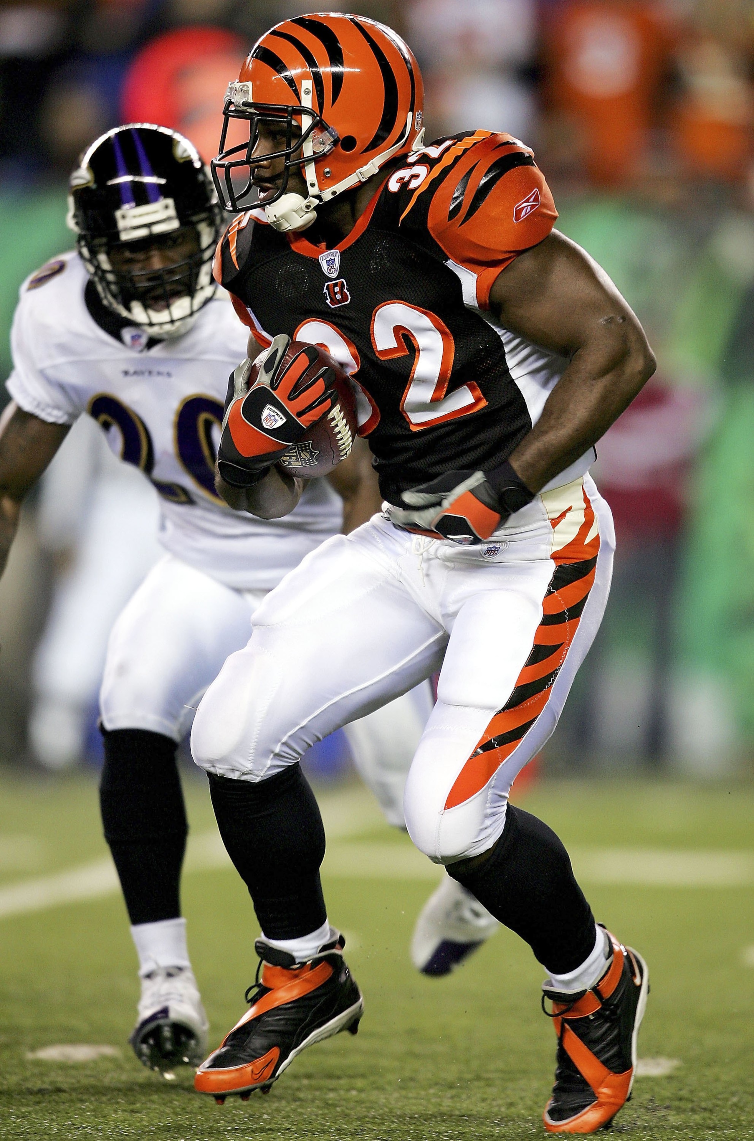 CINCINNATI - NOVEMBER 30:  Rudi Johnson #32 of the Cincinnati Bengals carries the ball against the Baltimore Ravens November 30, 2006 at Paul Brown Stadium in Cincinnati, Ohio.  (Photo by Matthew Stockman/Getty Images)