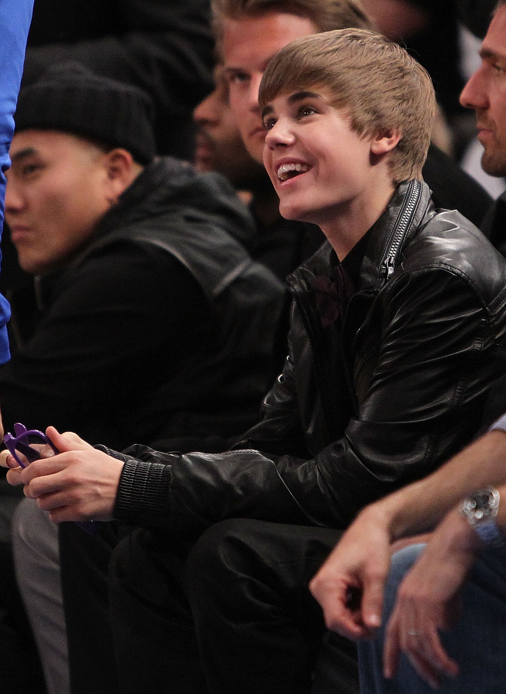 NEW YORK, NY - FEBRUARY 02:  Singer Justin Bieber sits courtside during the game between the New York Knicks and the Dallas Mavericks at Madison Square Garden on February 2, 2011 in New York City. NOTE TO USER: User expressly acknowledges and agrees that,