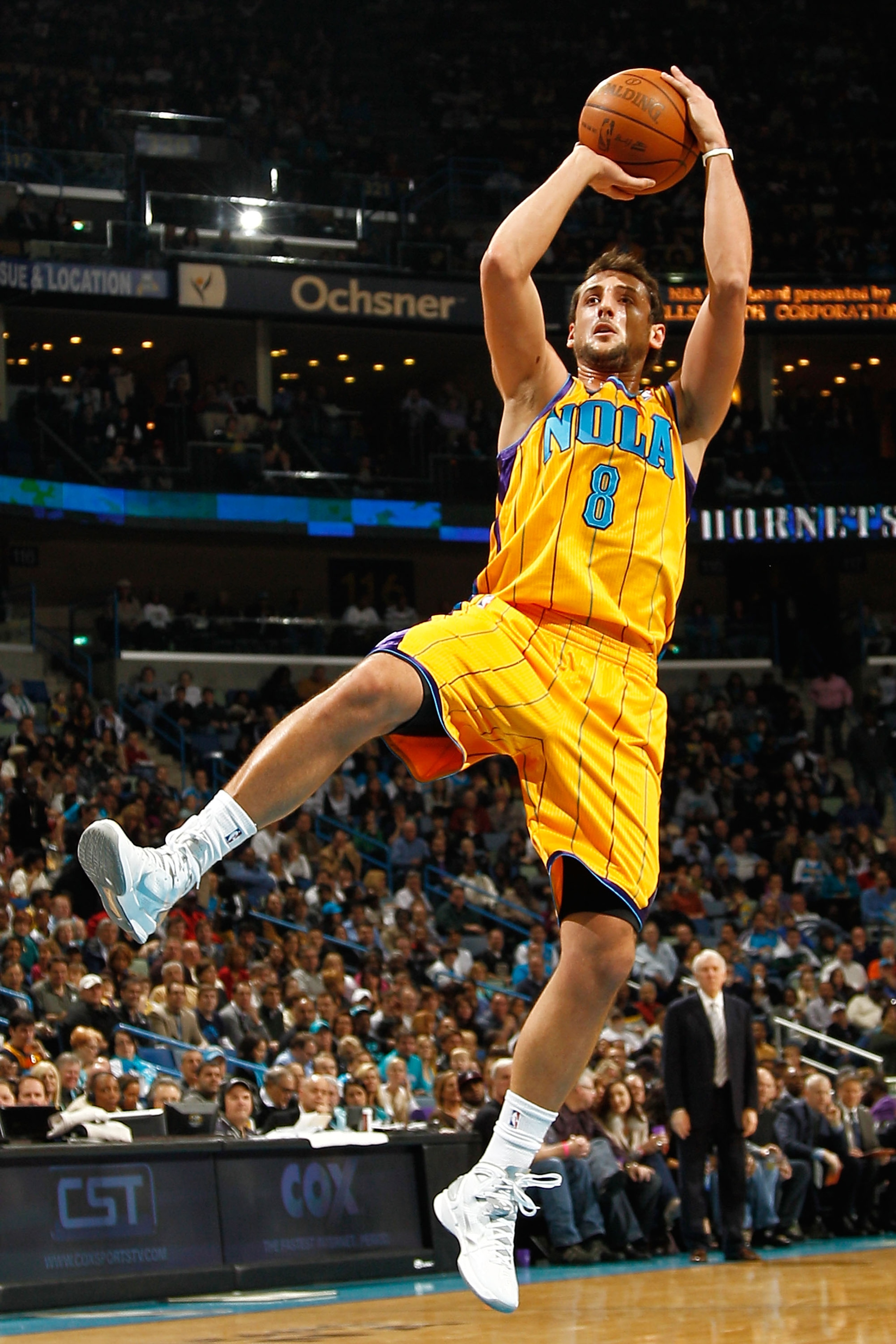 NEW ORLEANS, LA - JANUARY 22:  Marco Belinelli #8 of the New Orleans Hornets shoots the ball during the game against the San Antonio Spurs at the New Orleans Arena on January 22, 2011 in New Orleans, Louisiana.  The Hornets defeated the Spurs 96-72.  NOTE