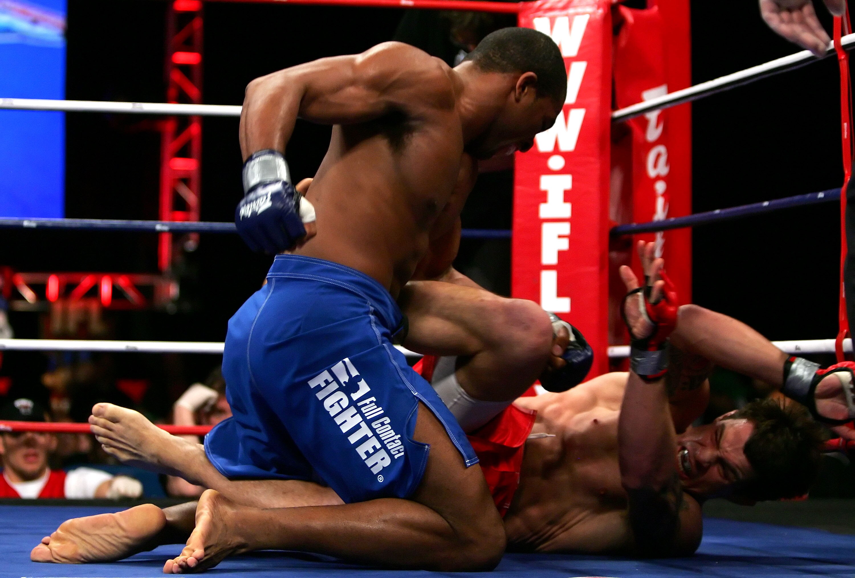 UNCASVILLE, CT - APRIL 13:  Gerald Harris (Blue Trunks) of the Wolfpacks battles against Fabio Leopoldo (Red Trunks) of the Pitbulls during their IFL match hosted by the International Fight League at the Mohegan Sun Arena on April 13, 2007 in Uncasville,