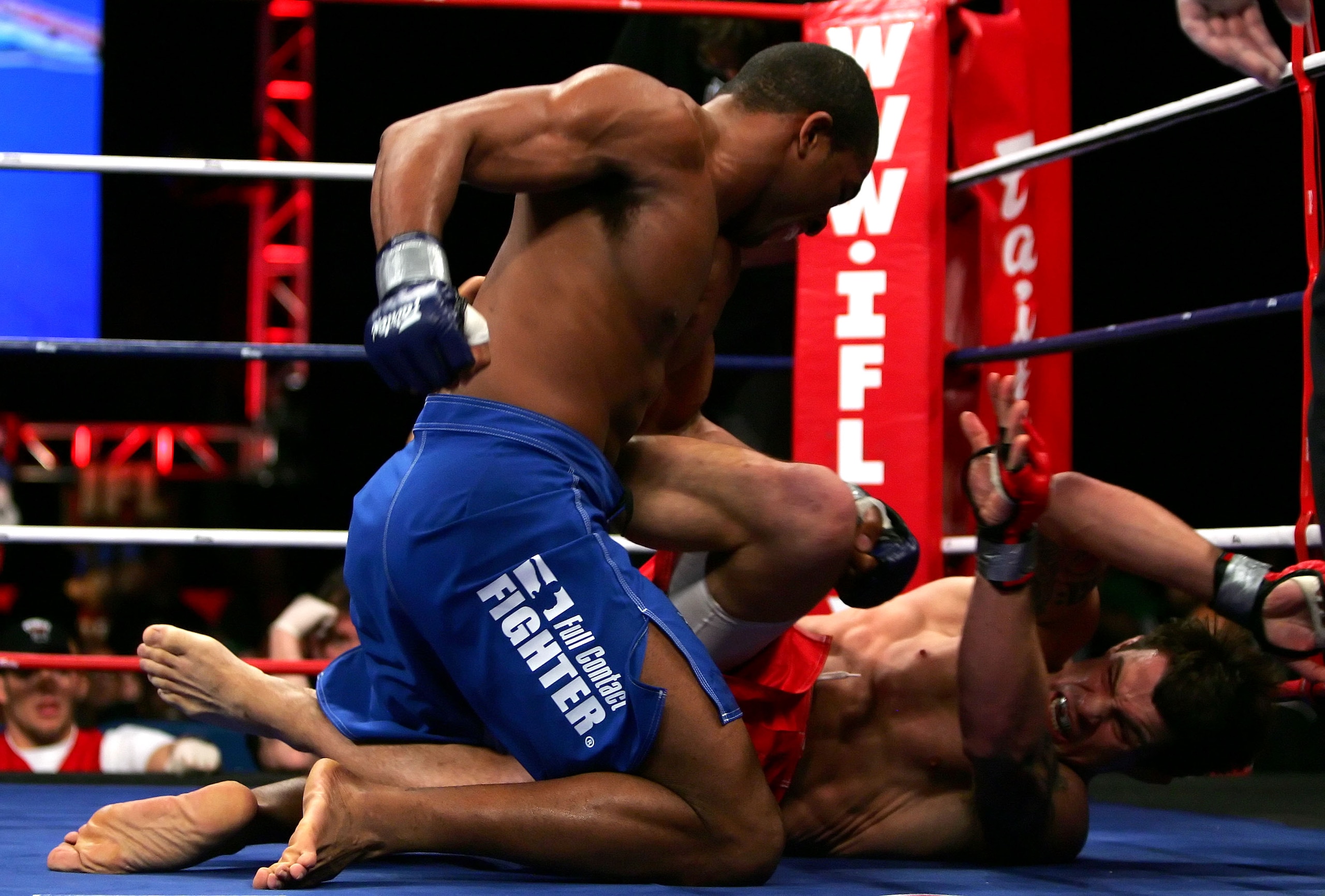 UNCASVILLE, CT - APRIL 13:  Gerald Harris (Blue Trunks) of the Wolfpacks battles against Fabio Leopoldo (Red Trunks) of the Pitbulls during their IFL match hosted by the International Fight League at the Mohegan Sun Arena on April 13, 2007 in Uncasville,