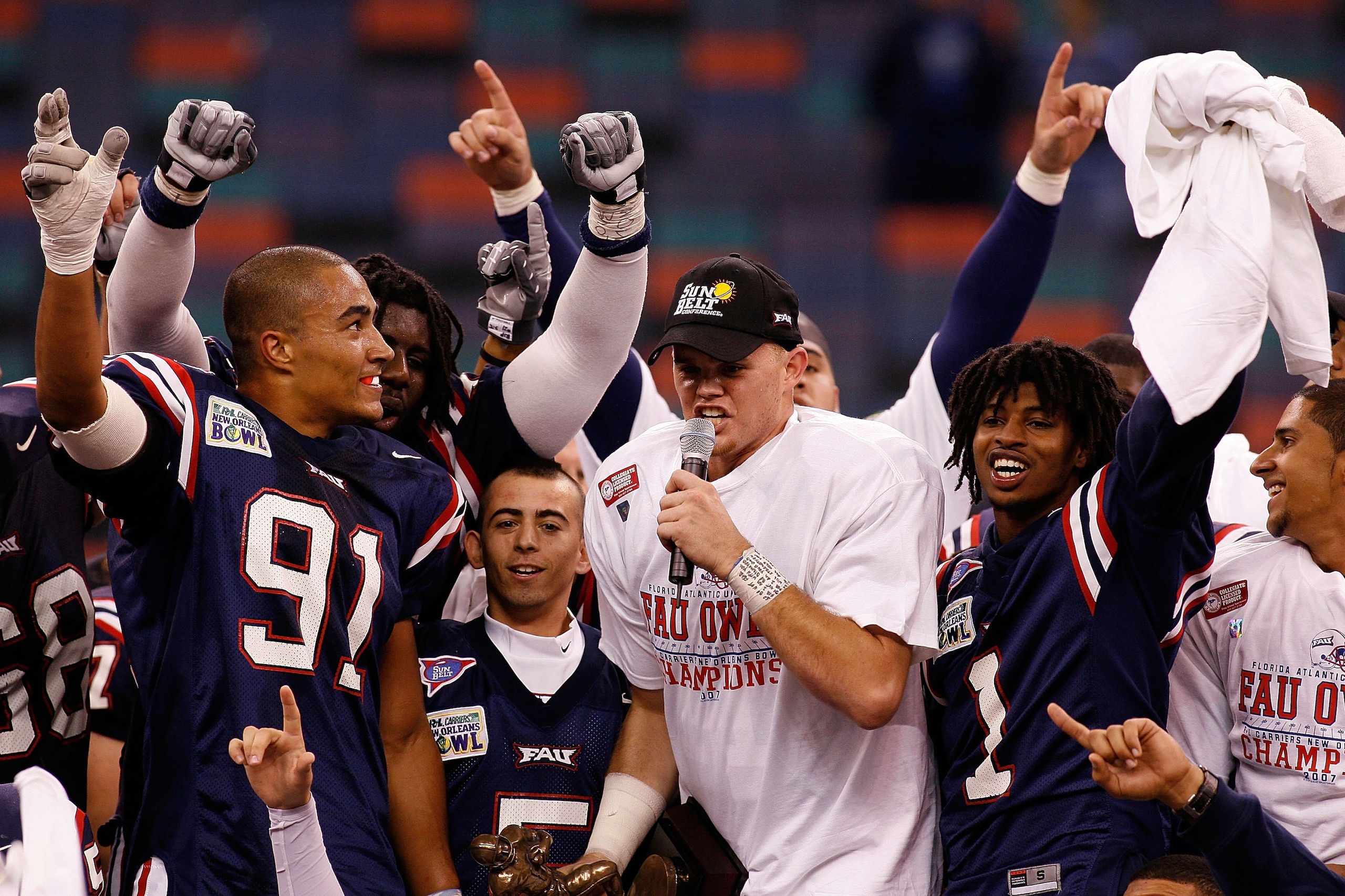 NEW ORLEANS - DECEMBER 21:  MVP and quarterback of the Florida Atlantic University Owls Rusty Smith #11 celebrates after defeating the Memphis University Tigers 44-27 in the New Orleans Bowl on December 21, 2007 at the Louisiana Superdome in New Orleans,