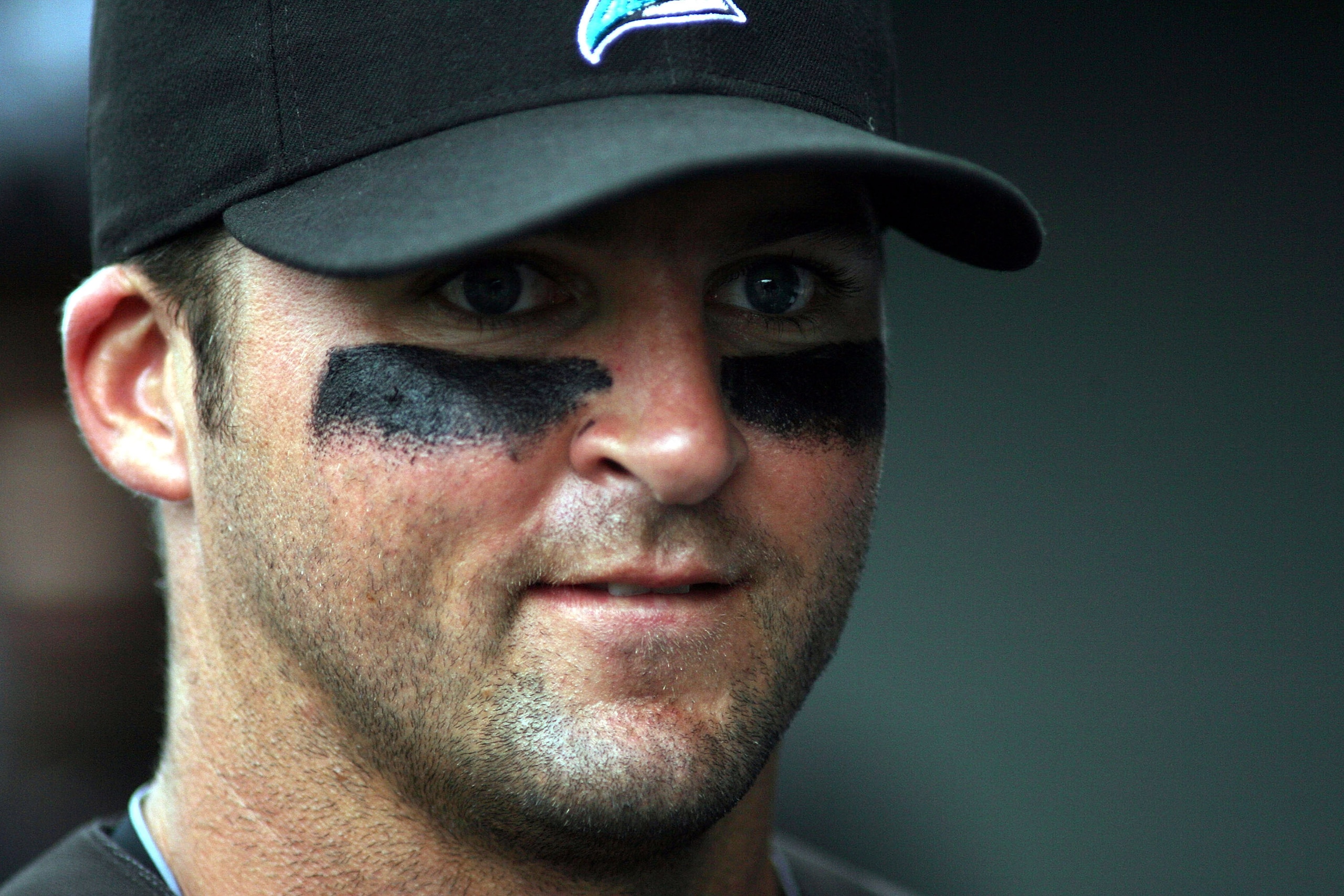 JUPITER, FL - MARCH 28:  Second baseman Dan Uggla #6 of the Florida Marlins walks in the duggout  against the Houston Astros on March 28, 2010 at Roger Dean Stadium in Jupiter, Florida.  (Photo by Marc Serota/Getty Images)