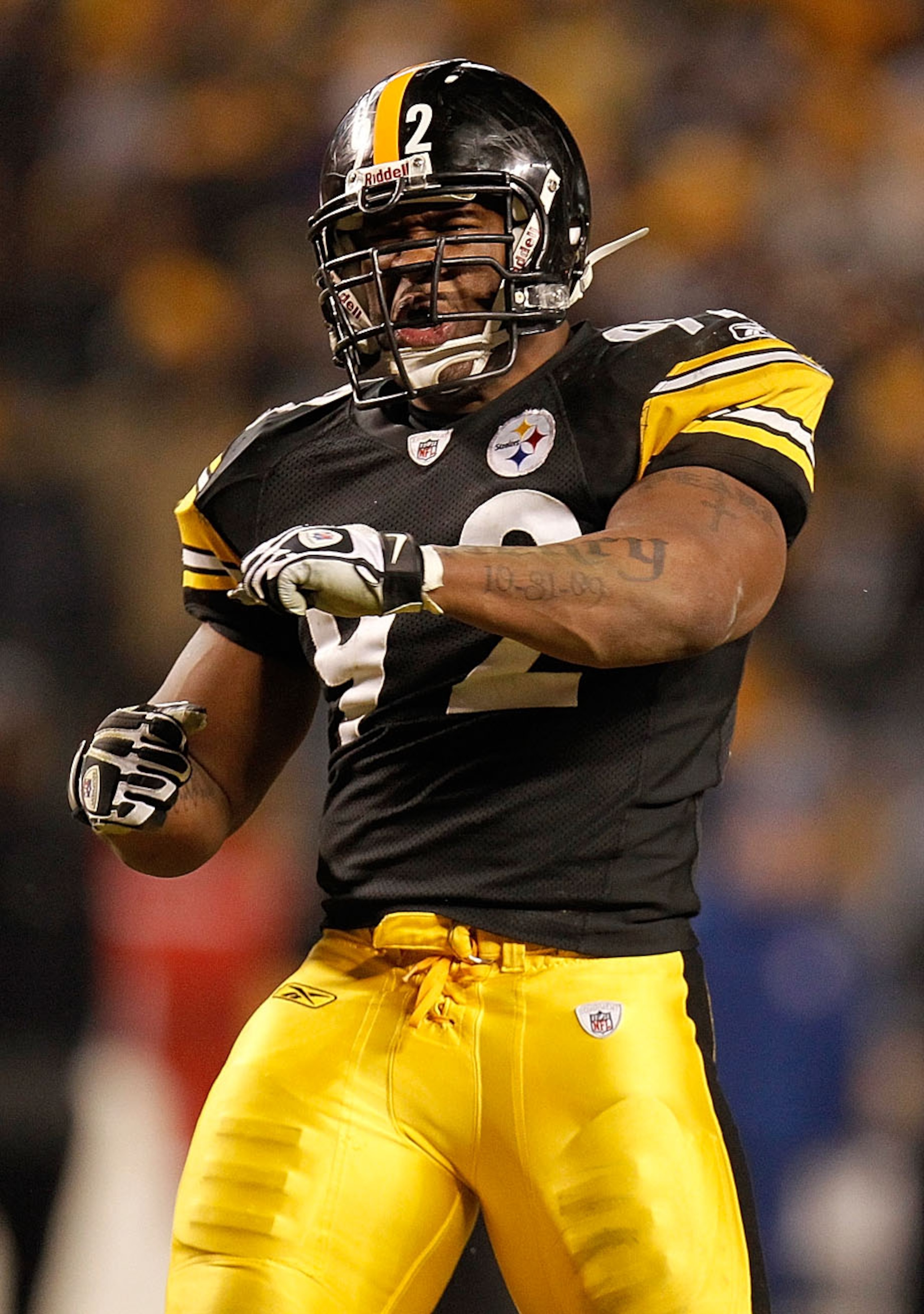 PITTSBURGH, PA - JANUARY 15:  Linebacker James Harrison #92 of the Pittsburgh Steelers celebrates after a play against the Baltimore Ravens during the AFC Divisional Playoff Game at Heinz Field on January 15, 2011 in Pittsburgh, Pennsylvania.  (Photo by G