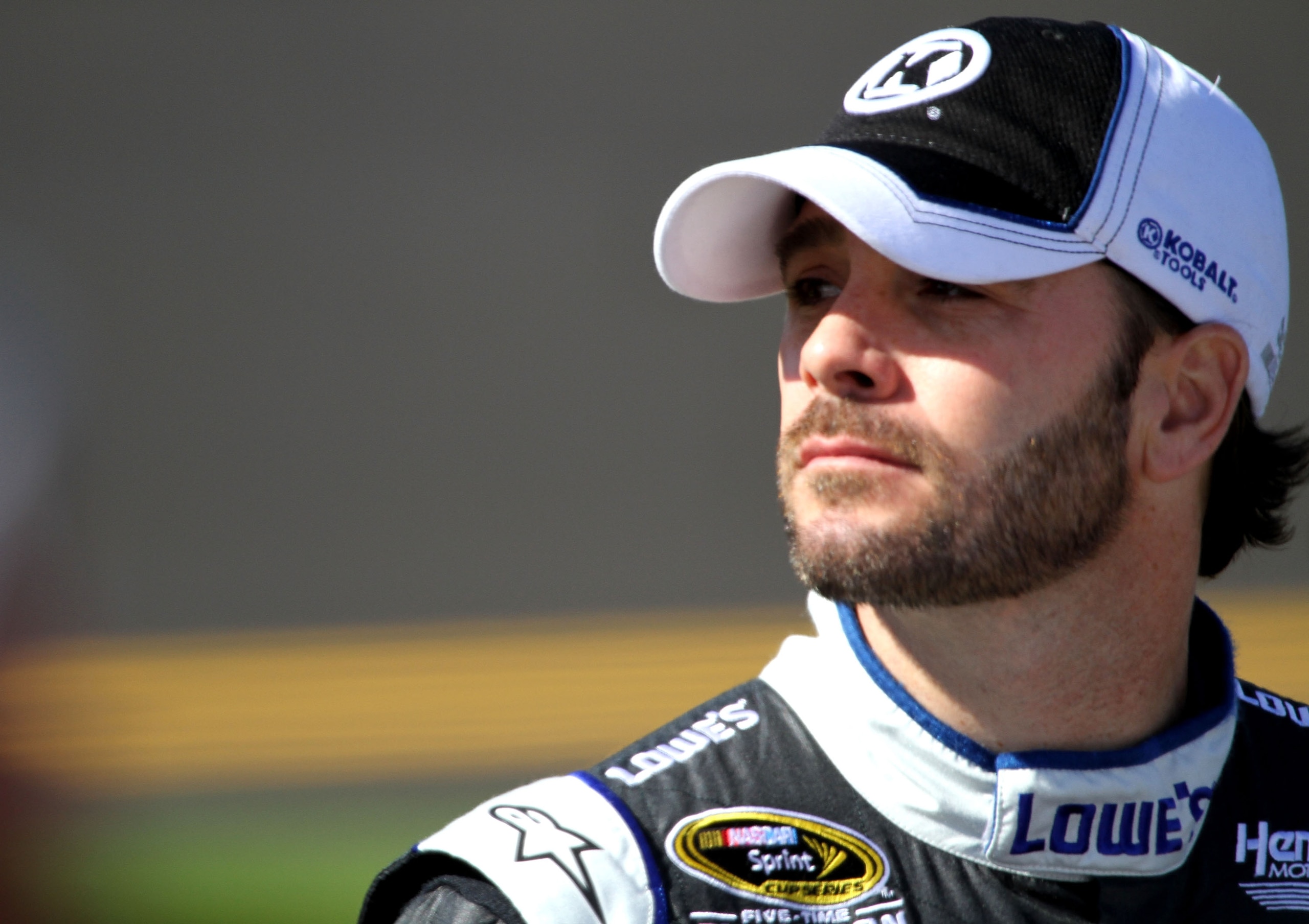 DAYTONA BEACH, FL - FEBRUARY 13:  Jimmie Johnson, driver of the #48 Lowe's Chevrolet, looks on during qualifying for the NASCAR Sprint Cup Series Daytona 500 at Daytona International Speedway on February 13, 2011 in Daytona Beach, Florida.  (Photo by Jerr