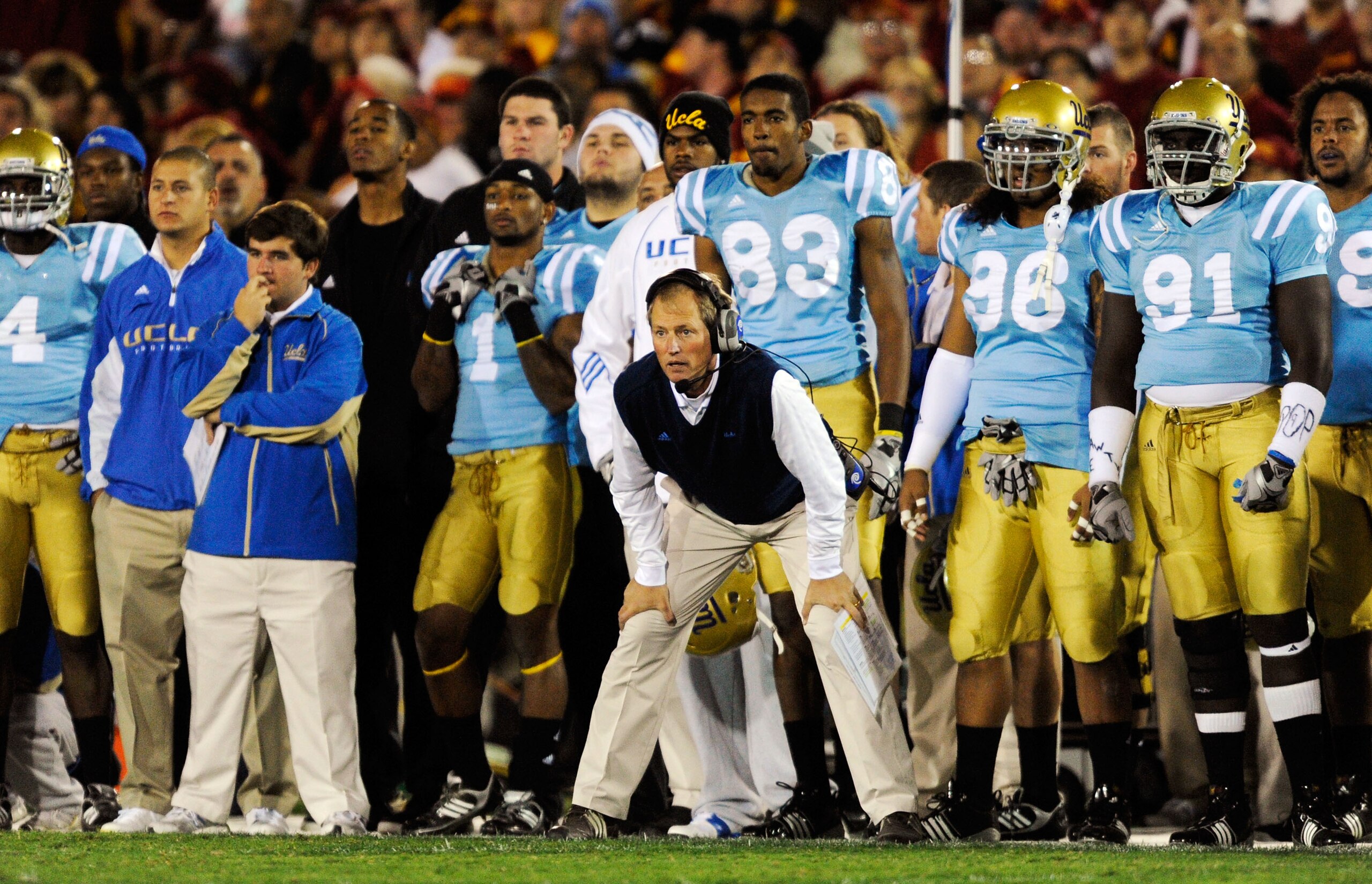 LOS ANGELES, CA - NOVEMBER 28:  Head coach Rick Neuheisel of the UCLA Bruins follows the action from the sideline against USC Trojans during the first quarter of the NCAA college football game at Los Angeles Memorial Coliseum on November 28, 2009 in Los A