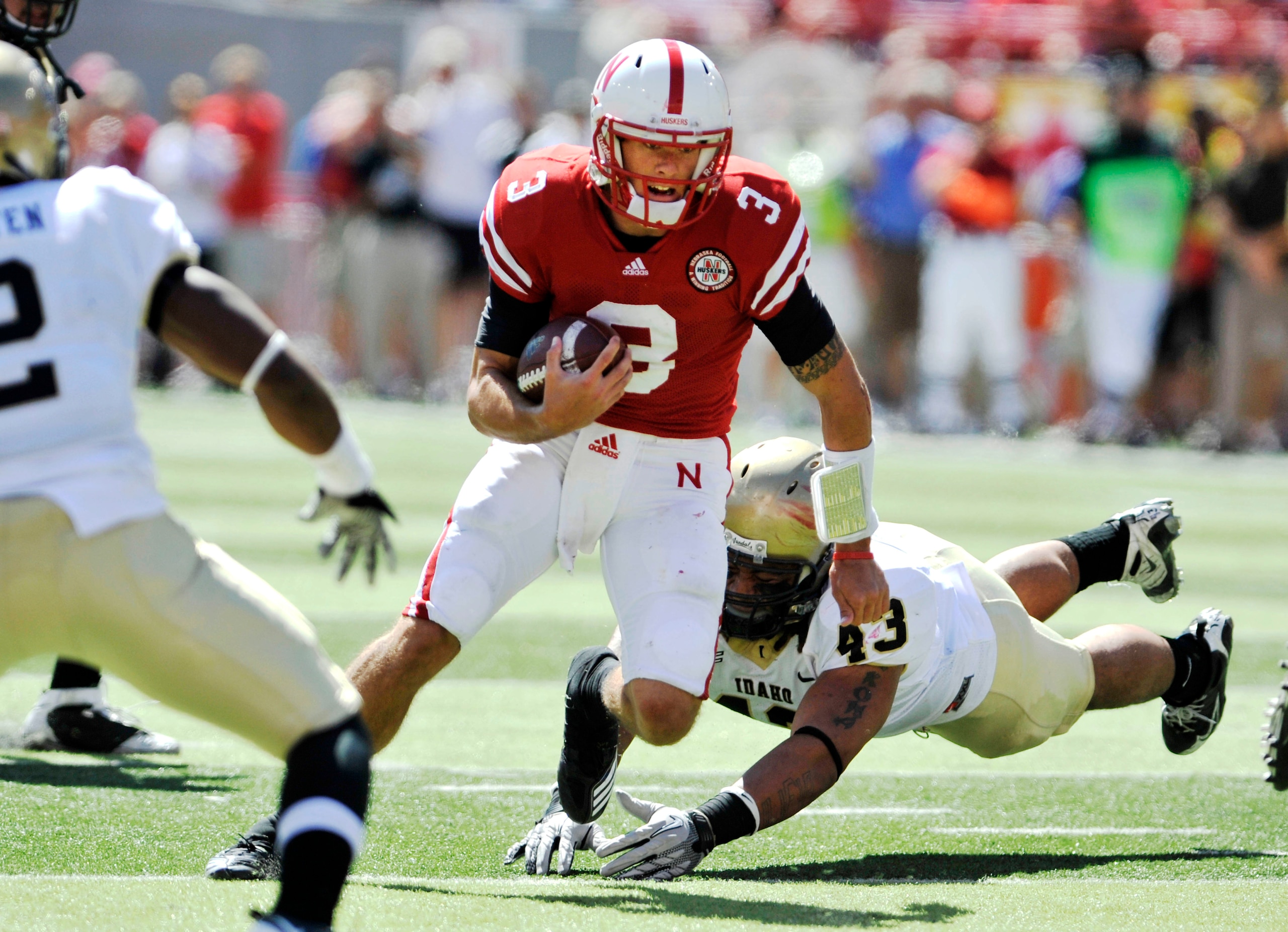 LINCOLN, NEBRASKA - SEPTEMBER 11: Nebraska Cornhuskers quarterback Taylor Martinez #3 works twoard the endzone during first half action of their game at Memorial Stadium on September 4, 2010 in Lincoln, Nebraska. Martinez covered the ball in the end zone