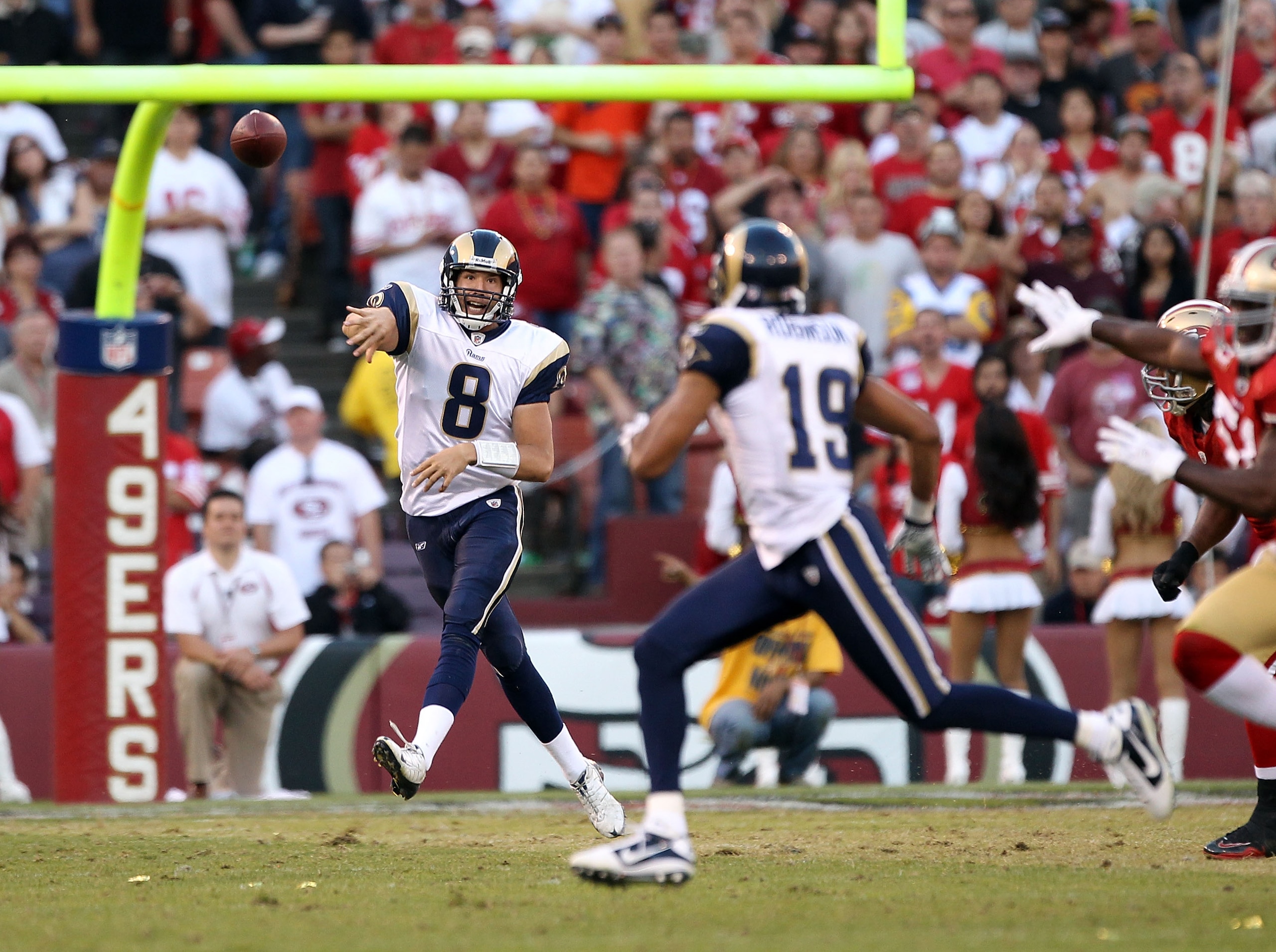 SAN FRANCISCO - NOVEMBER 14:  Sam Bradford #8  of the St. Louis Rams in action against the San Francisco 49ers at Candlestick Park on November 14, 2010 in San Francisco, California.  (Photo by Ezra Shaw/Getty Images)