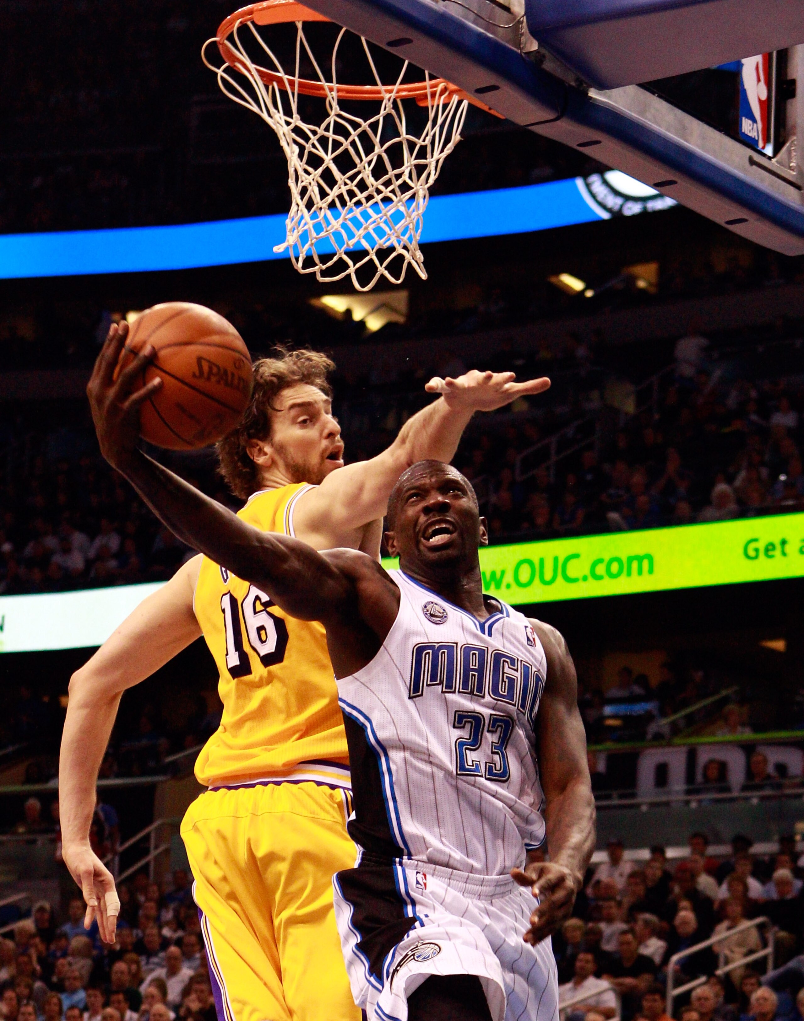 ORLANDO, FL - FEBRUARY 13:  Jason Richardson #23 of the Orlando Magic attempts a shot against Pau Gasol #16 of the Los Angeles Lakers during the game at Amway Arena on February 13, 2011 in Orlando, Florida.  NOTE TO USER: User expressly acknowledges and a