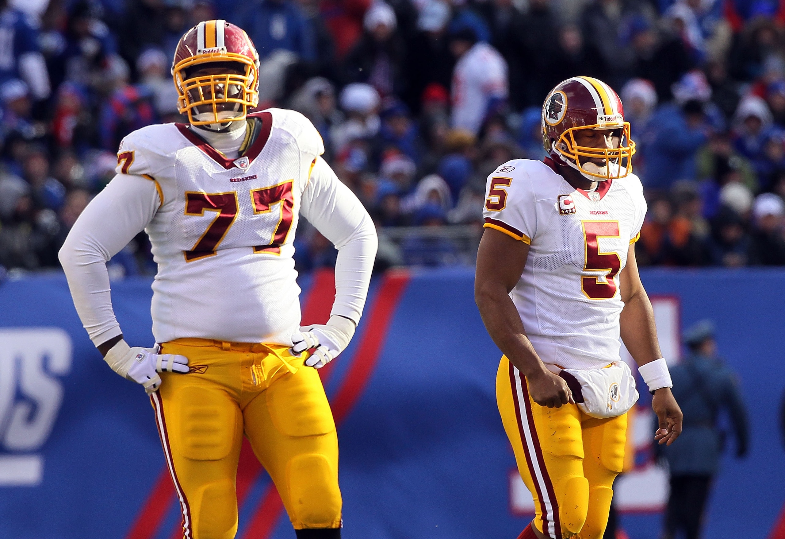 EAST RUTHERFORD, NJ - DECEMBER 05:  Donovan McNabb #5 and Jammal Brown #77 of the Washington Redskins looks on against the New York Giants on December 5, 2010 at the New Meadowlands Stadium in East Rutherford, New Jersey.  (Photo by Jim McIsaac/Getty Imag