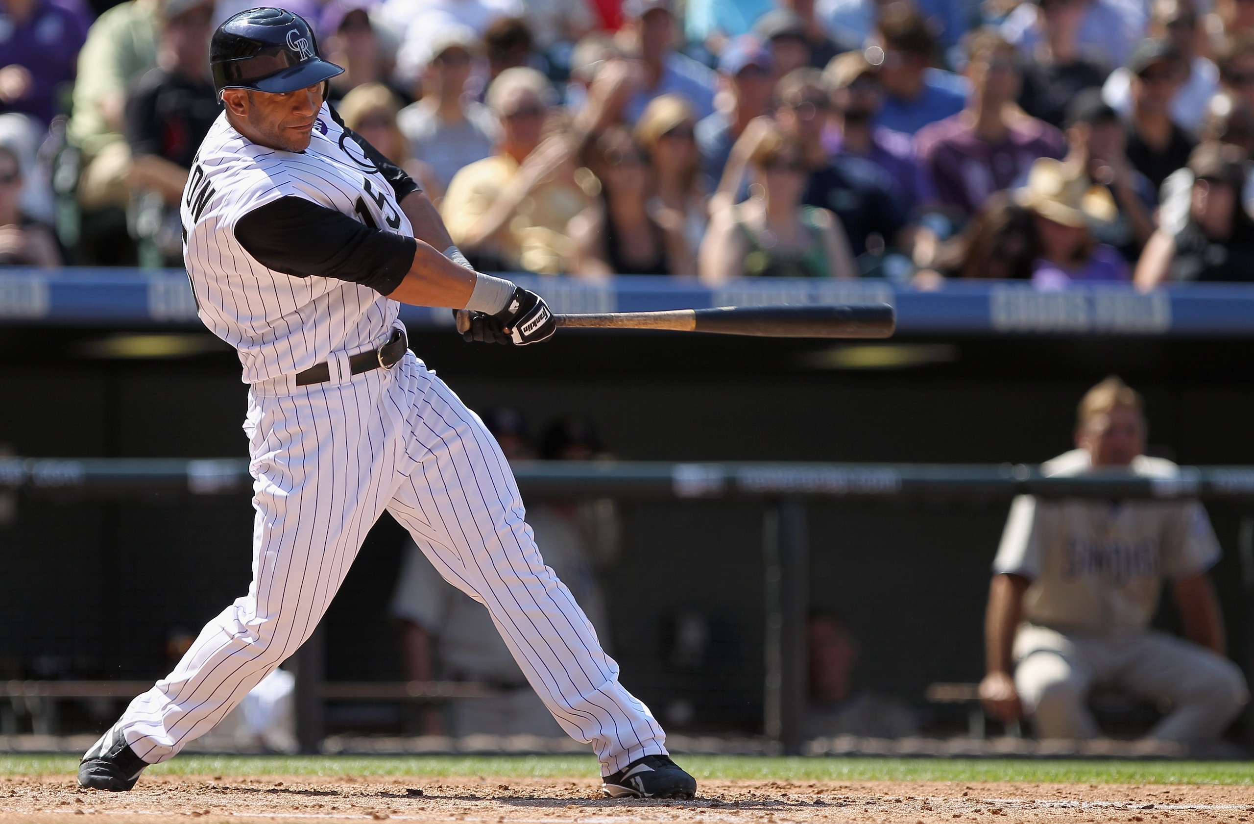 DENVER - SEPTEMBER 15:  Jay Payton #16 of the Colorado Rockies takes an at bat against the San Diego Padres at Coors Field on September 15, 2010 in Denver, Colorado. The Rockies defeated the Padres 9-6.  (Photo by Doug Pensinger/Getty Images)