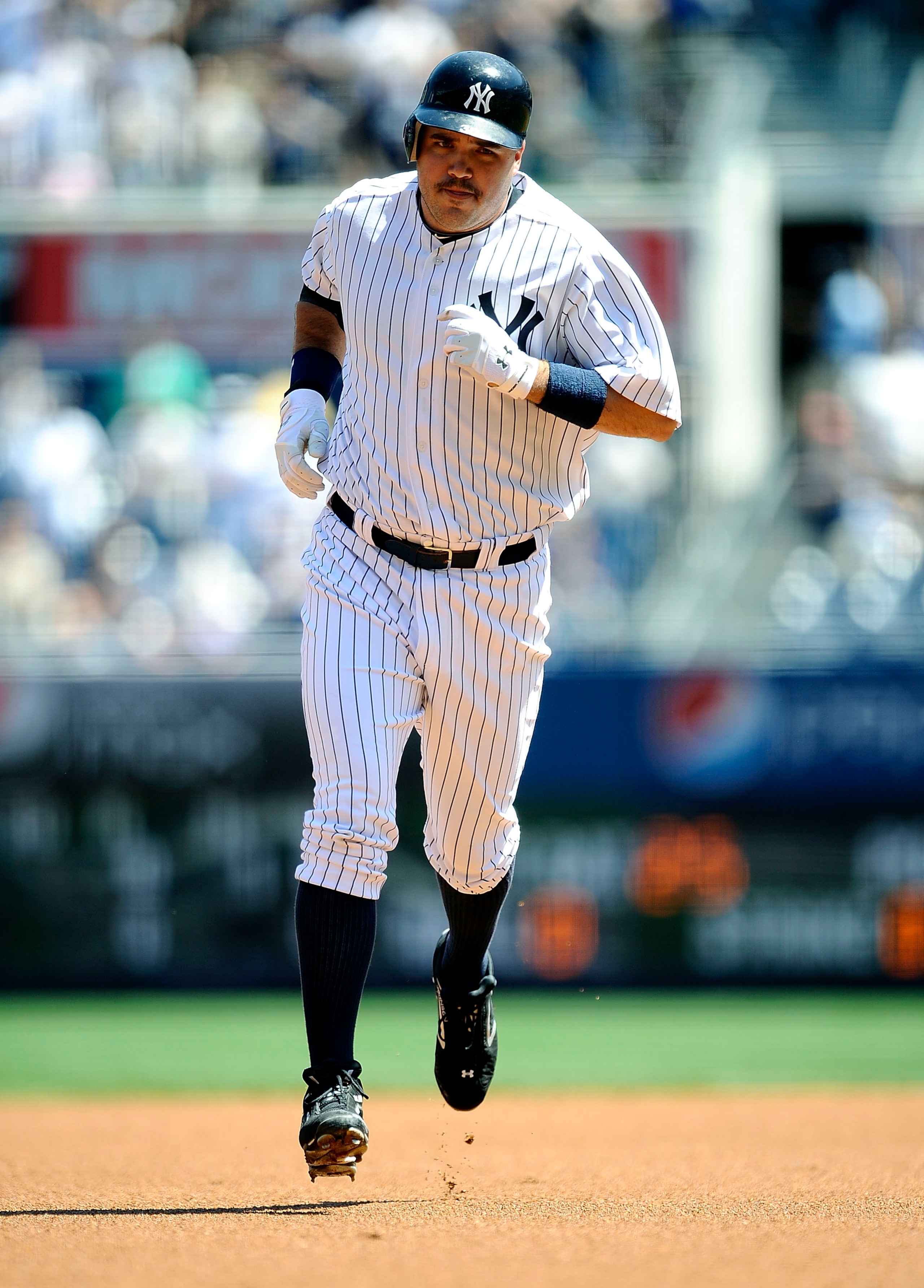 NEW YORK - MAY 05:  Nick Johnson #36 of the New York Yankees rounds the bases on a solo home run against the Baltimore Orioles at Yankee Stadium on May 5, 2010 in the Bronx borough of New York City  (Photo by Jeff Zelevansky/Getty Images)