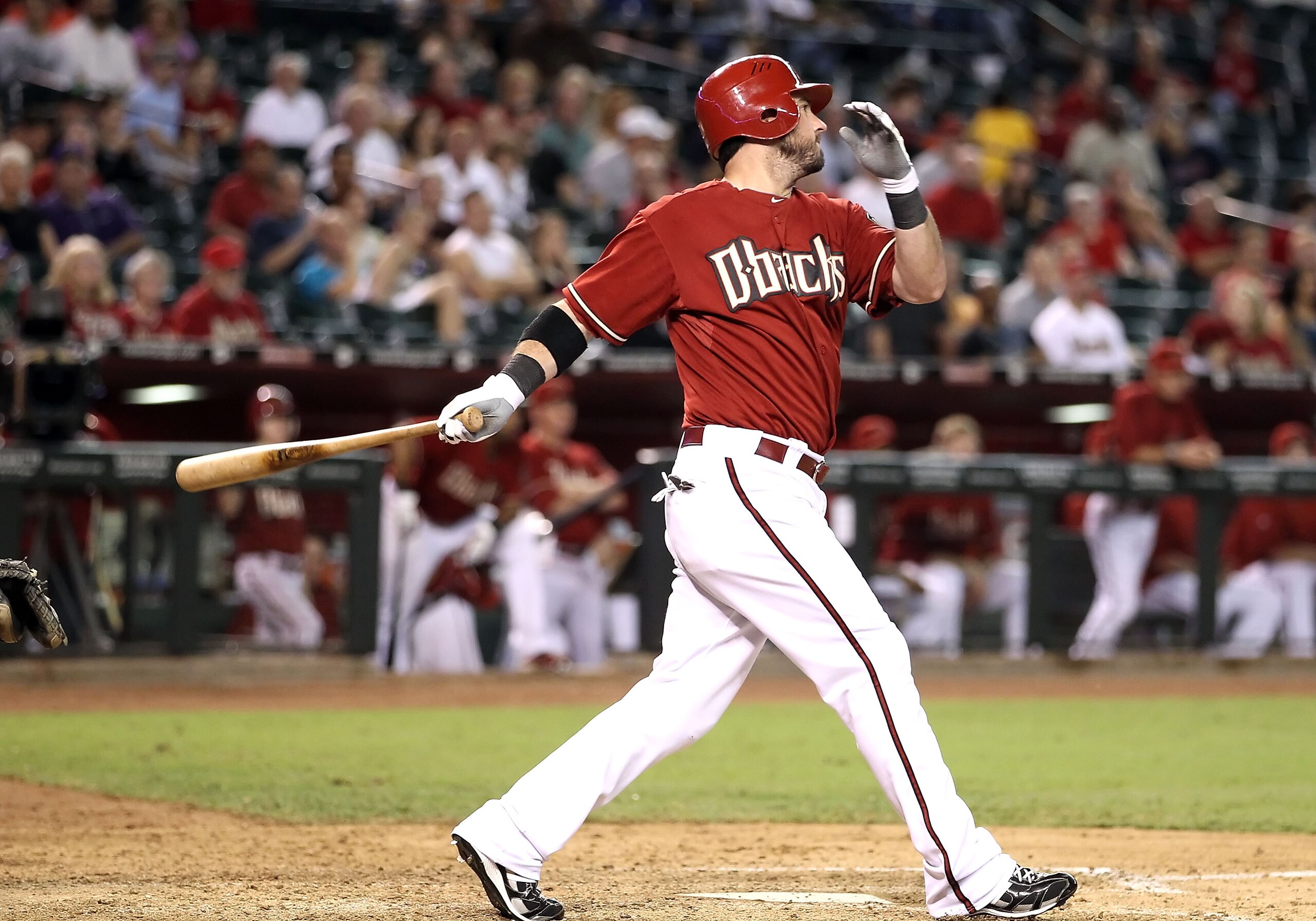 PHOENIX - SEPTEMBER 22:  Ryan Church #19 of the Arizona Diamondbacks hits a RBI single against the Colorado Rockies during the eighth inning of the Major League Baseball game at Chase Field on September 22, 2010 in Phoenix, Arizona.  (Photo by Christian P