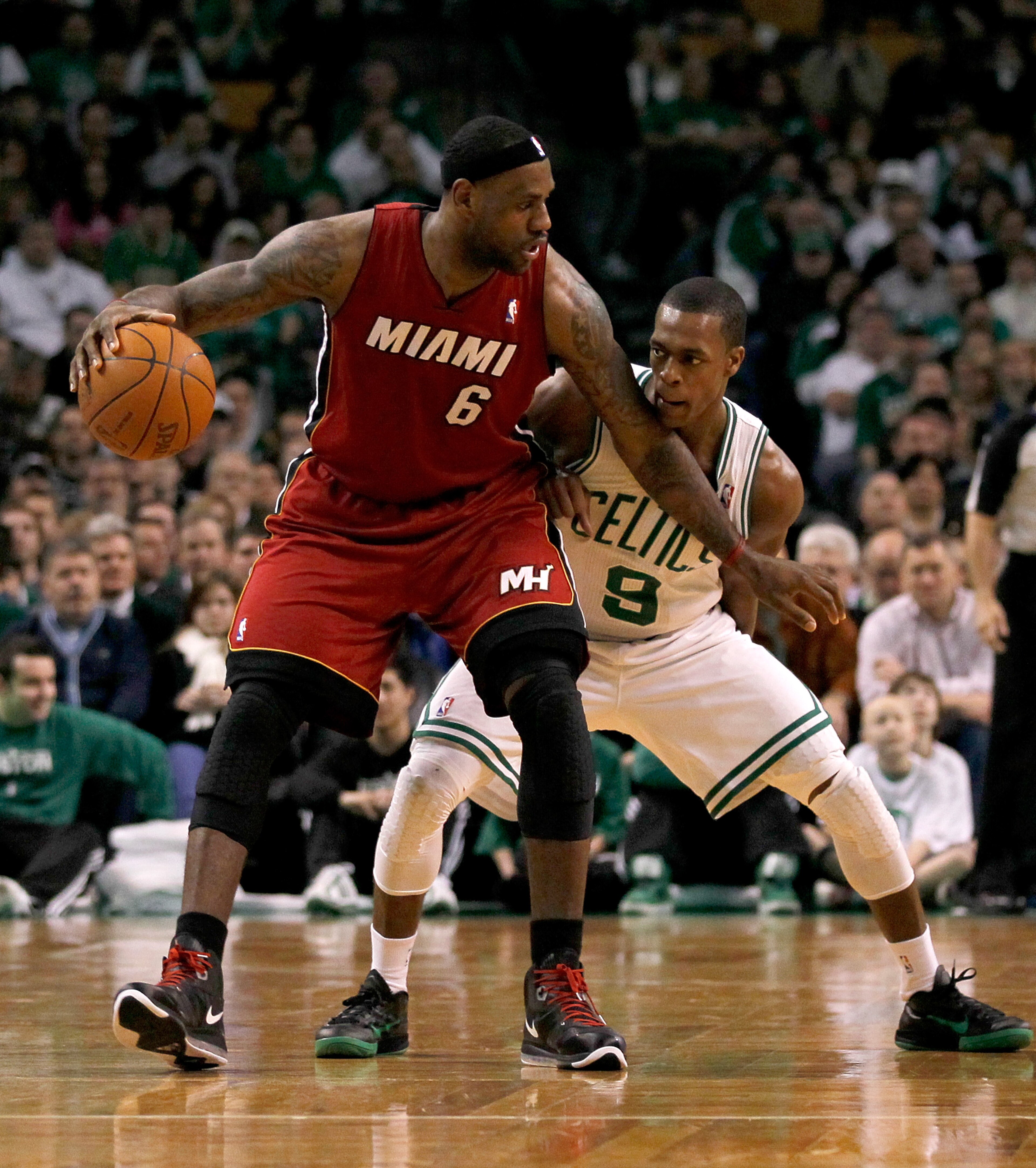 BOSTON - FEBRUARY 13: LeBron James #6 of the Miami Heat battles Rajon Rondo #9 of the Boston Celtics ffor control of the ball at TD Garden on February 13, 2011 in Boston, Massachusetts. NOTE TO USER: User expressly acknowledges and agrees that, by downlo BOSTON - FEBRUARY 13: LeBron James #6 of the Miami Heat battles Rajon Rondo #9 of the Boston Celtics ffor control of the ball at TD Garden on February 13, 2011 in Boston, Massachusetts. NOTE TO USER: User expressly acknowledges and agrees that, by downlo
