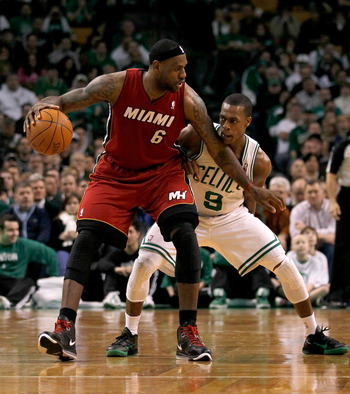 BOSTON - FEBRUARY 13:  LeBron James #6 of the Miami Heat battles Rajon Rondo #9 of the Boston Celtics ffor control of the ball at TD Garden on February 13, 2011 in Boston, Massachusetts. NOTE TO USER: User expressly acknowledges and agrees that, by downlo