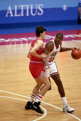 BARCELONA, SPAIN - AUGUST 8:  Earvin Magic Johnson #15 of the United States moves the ball in the 1992 Olympic game against Croatia on August 8, 1992 in Barcelona, Spain. The 'Dream Team' defeated Croatia 117-85. NOTE TO USER: User expressly acknowledges