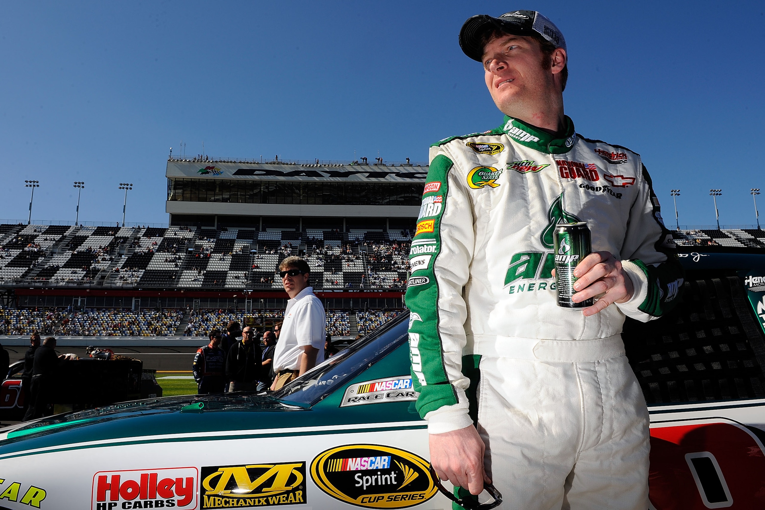 DAYTONA BEACH, FL - FEBRUARY 13:  Dale Earnhardt Jr., driver of the #88 National Guard/AMP Energy Chevrolet, looks on from the grid during qualifying for the NASCAR Sprint Cup Series Daytona 500 at Daytona International Speedway on February 13, 2011 in Da