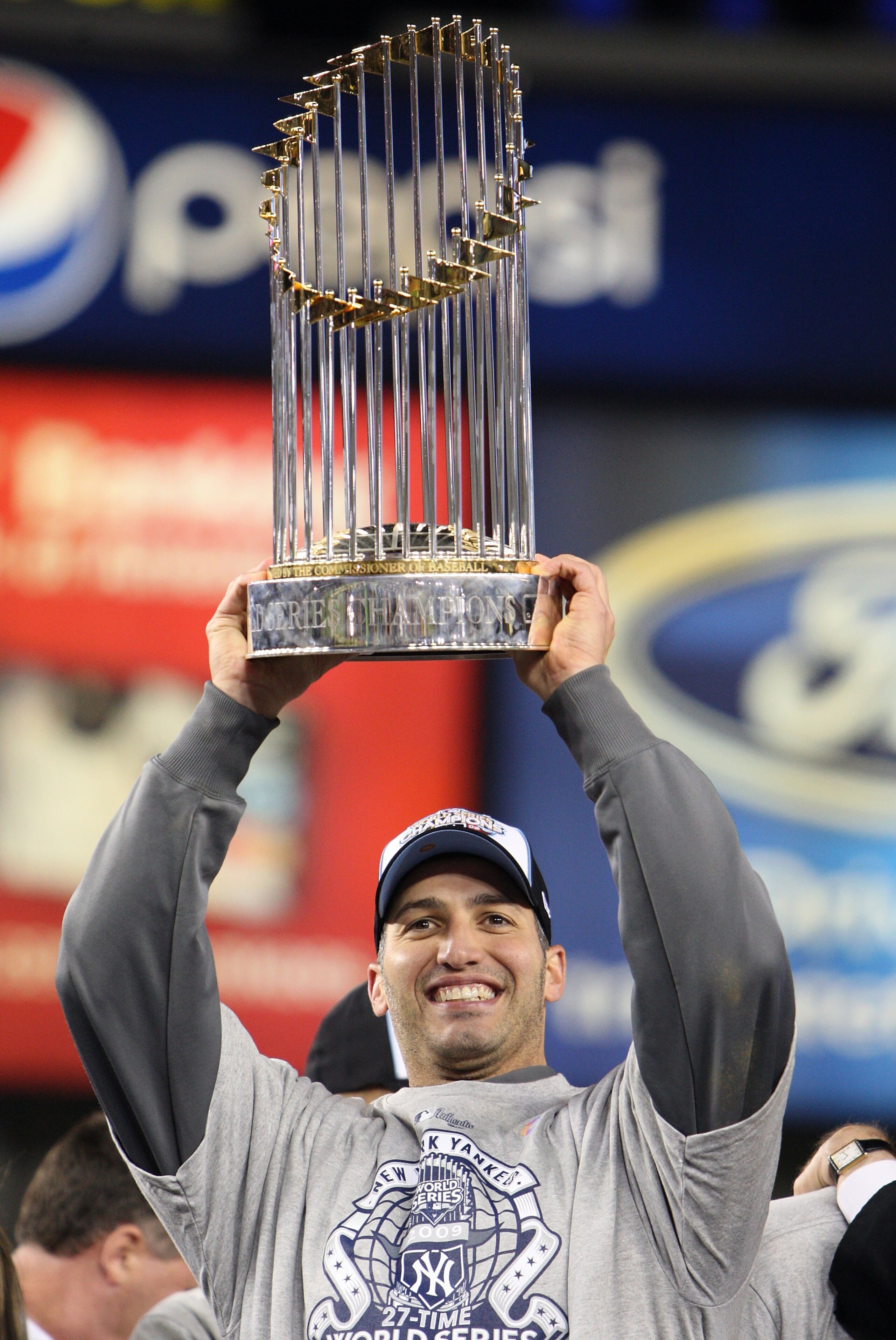 NEW YORK - NOVEMBER 04: Andy Pettitte #46 of the New York Yankees celebrates with the trophy after their 7-3 win against the Philadelphia Phillies in Game Six of the 2009 MLB World Series at Yankee Stadium on November 4, 2009 in the Bronx borough of New NEW YORK - NOVEMBER 04: Andy Pettitte #46 of the New York Yankees celebrates with the trophy after their 7-3 win against the Philadelphia Phillies in Game Six of the 2009 MLB World Series at Yankee Stadium on November 4, 2009 in the Bronx borough of New