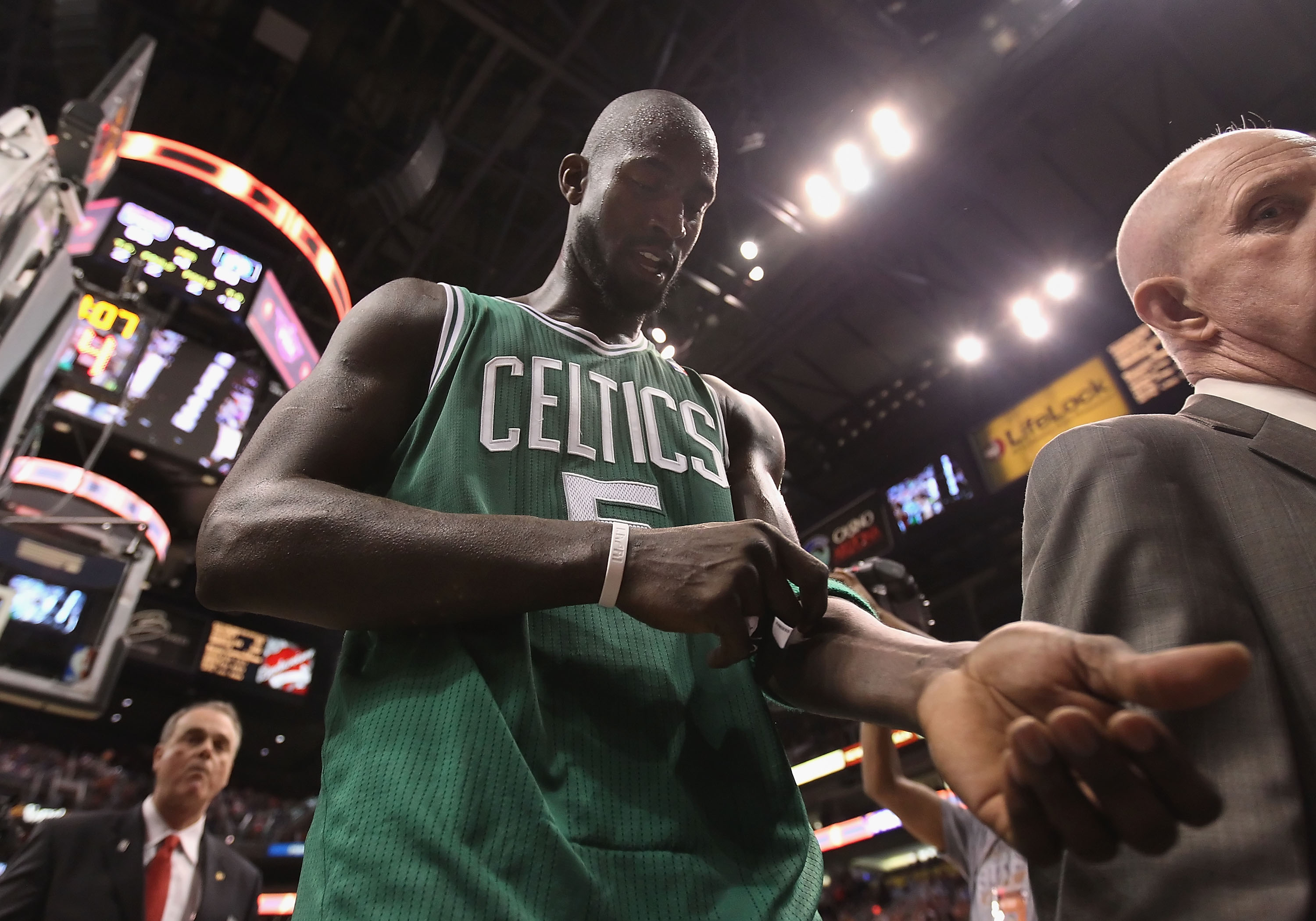 PHOENIX, AZ - JANUARY 28:  Kevin Garnett #5 of the Boston Celtics walks off the court after being ejected for a double technical foul against the Phoenix Suns during the NBA game at US Airways Center on January 28, 2011 in Phoenix, Arizona.  The Suns defe