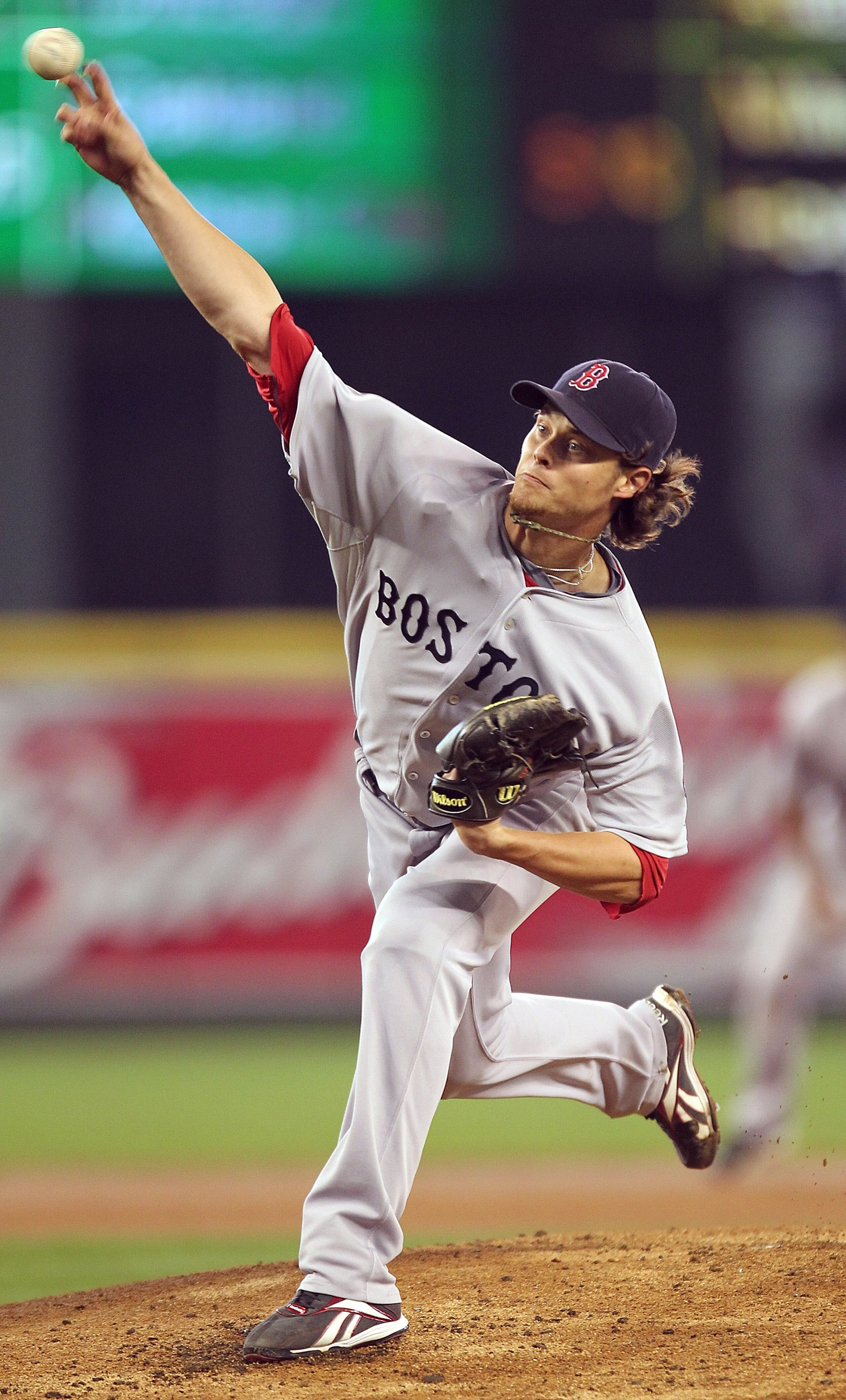 SEATTLE - SEPTEMBER 15: Starting pitcher Clay Buchholz #11 of the Boston Red Sox pitches against the Seattle Mariners at Safeco Field on September 15, 2010 in Seattle, Washington. The Red Sox defeated the Mariners 5-1. (Photo by Otto Greule Jr/Getty Imag SEATTLE - SEPTEMBER 15: Starting pitcher Clay Buchholz #11 of the Boston Red Sox pitches against the Seattle Mariners at Safeco Field on September 15, 2010 in Seattle, Washington. The Red Sox defeated the Mariners 5-1. (Photo by Otto Greule Jr/Getty Imag