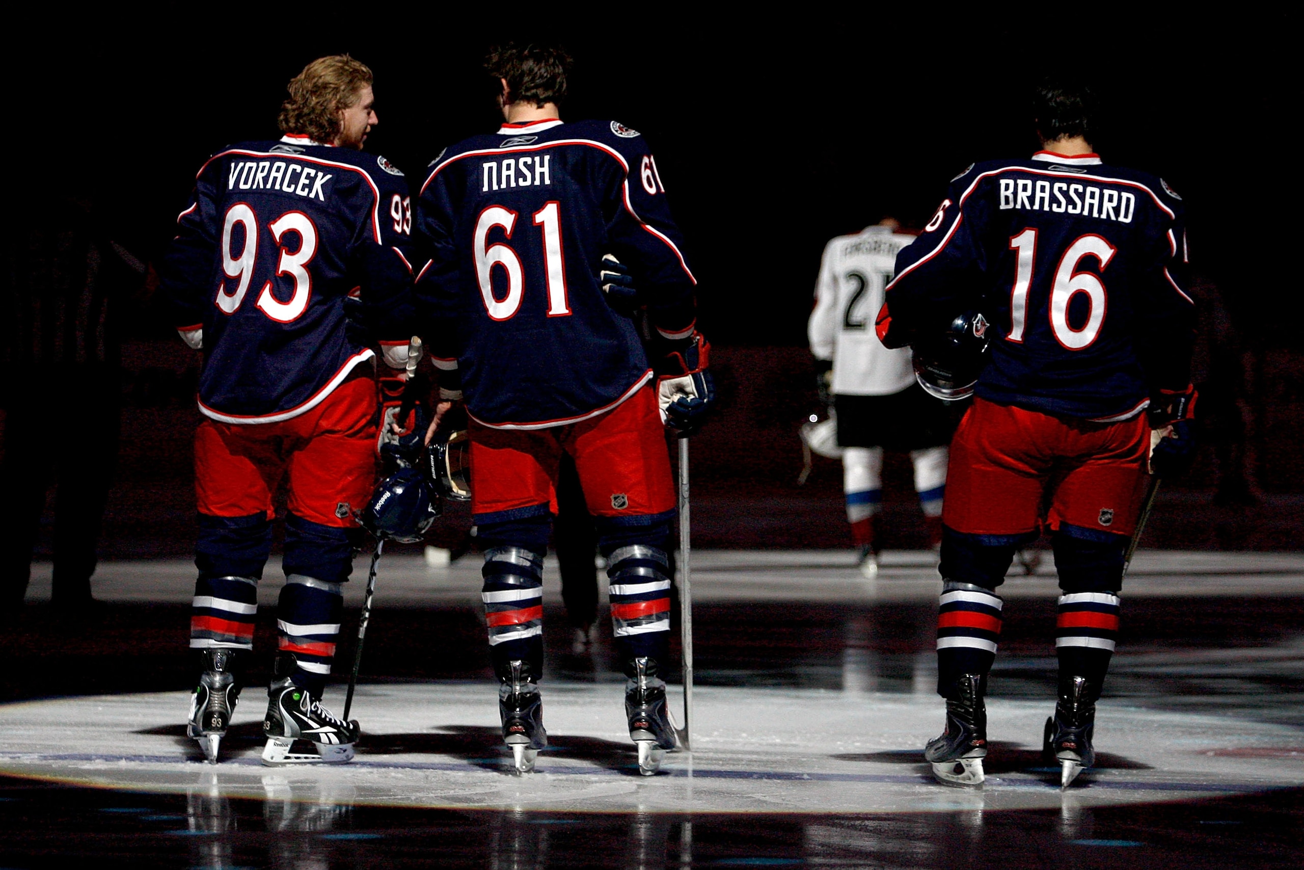 COLUMBUS, OH - FEBRUARY 11: Jakub Voracek #93, Rick Nash #61, and Derick Brassard #16, all of the Columbus Blue Jackets stand during the National Anthem prior to the start of the game against the Colorado Avalanche on February 11, 2011 at Nationwide Arena