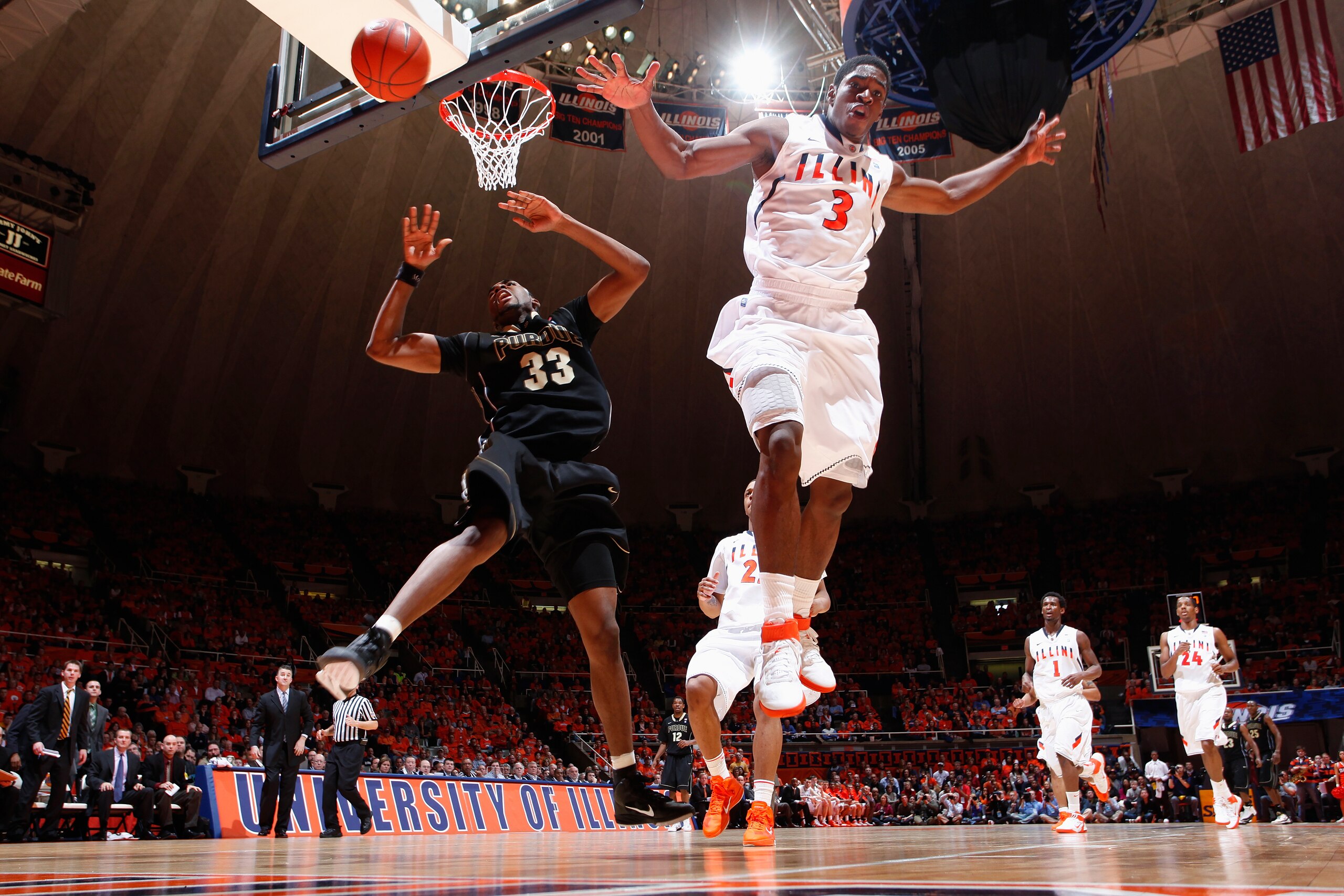 CHAMPAIGN, IL - FEBRUARY 13: Brandon Paul #3 of the Illinois Fighting Illini blocks a layup by E'Twaun Moore #33 of the Purdue Boilermakers at Assembly Hall on February 13, 2011 in Champaign, Illinois. Purdue defeated Illinois 81-70. (Photo by Joe Robbins