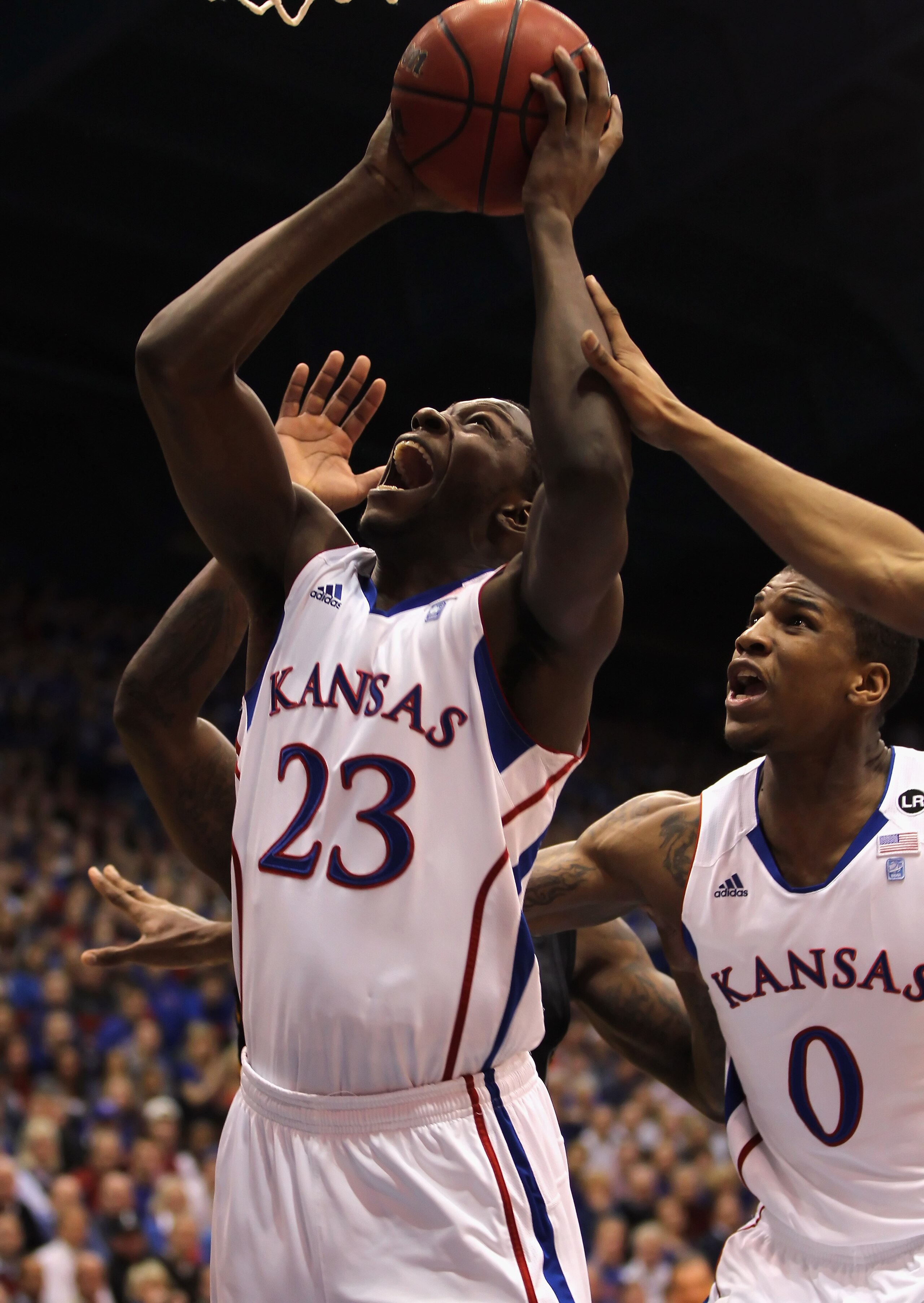 LAWRENCE, KS - FEBRUARY 07:  Mario Little #23 of the Kansas Jayhawks shoots during the game against the Missouri Tigers on February 7, 2011 at Allen Fieldhouse in Lawrence, Kansas.  (Photo by Jamie Squire/Getty Images)