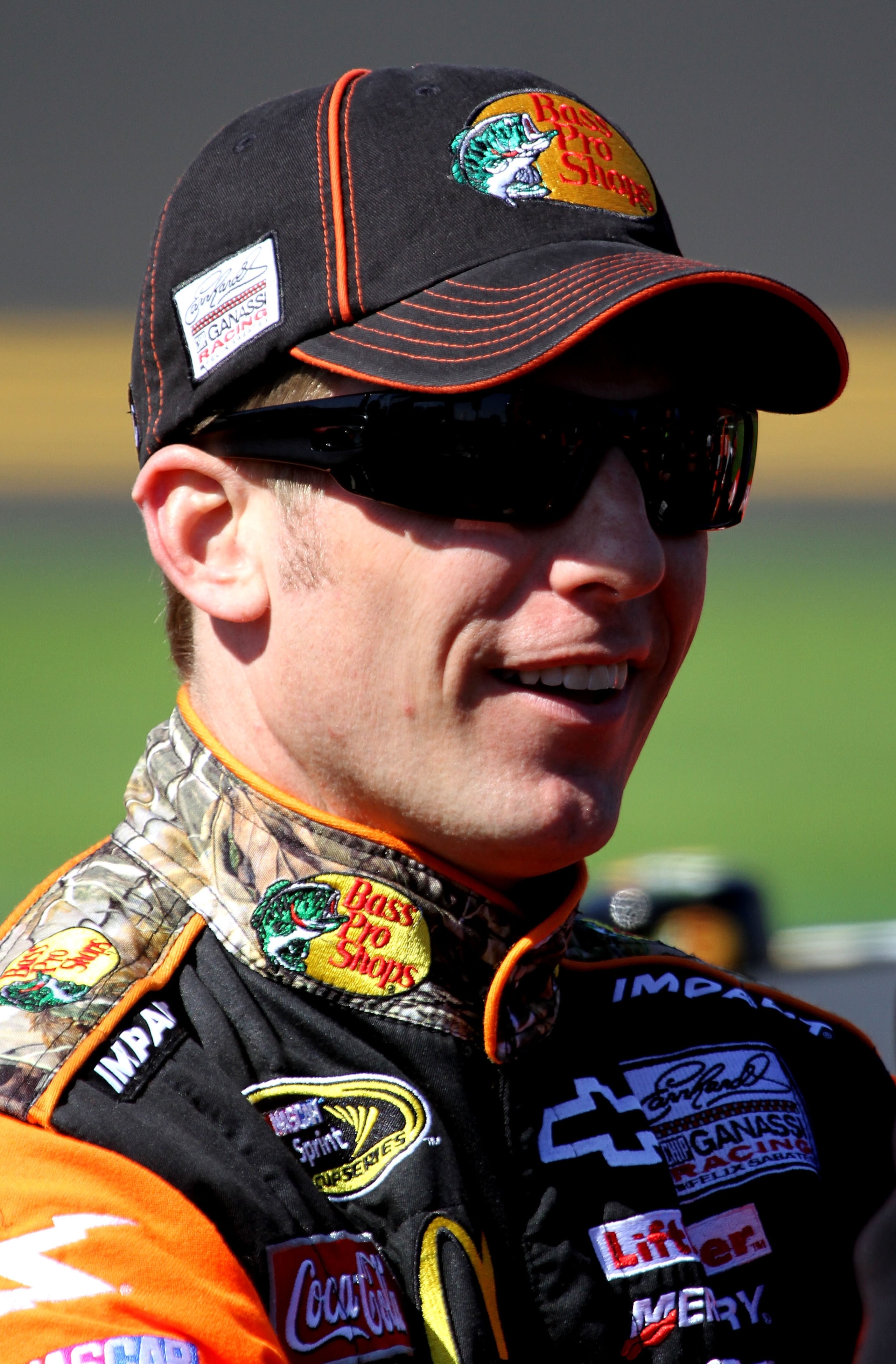 DAYTONA BEACH, FL - FEBRUARY 13:  Jamie McMurray, driver of the #1 Bass Pro Shops Chevrolet, looks on during qualifying for the NASCAR Sprint Cup Series Daytona 500 at Daytona International Speedway on February 13, 2011 in Daytona Beach, Florida.  (Photo