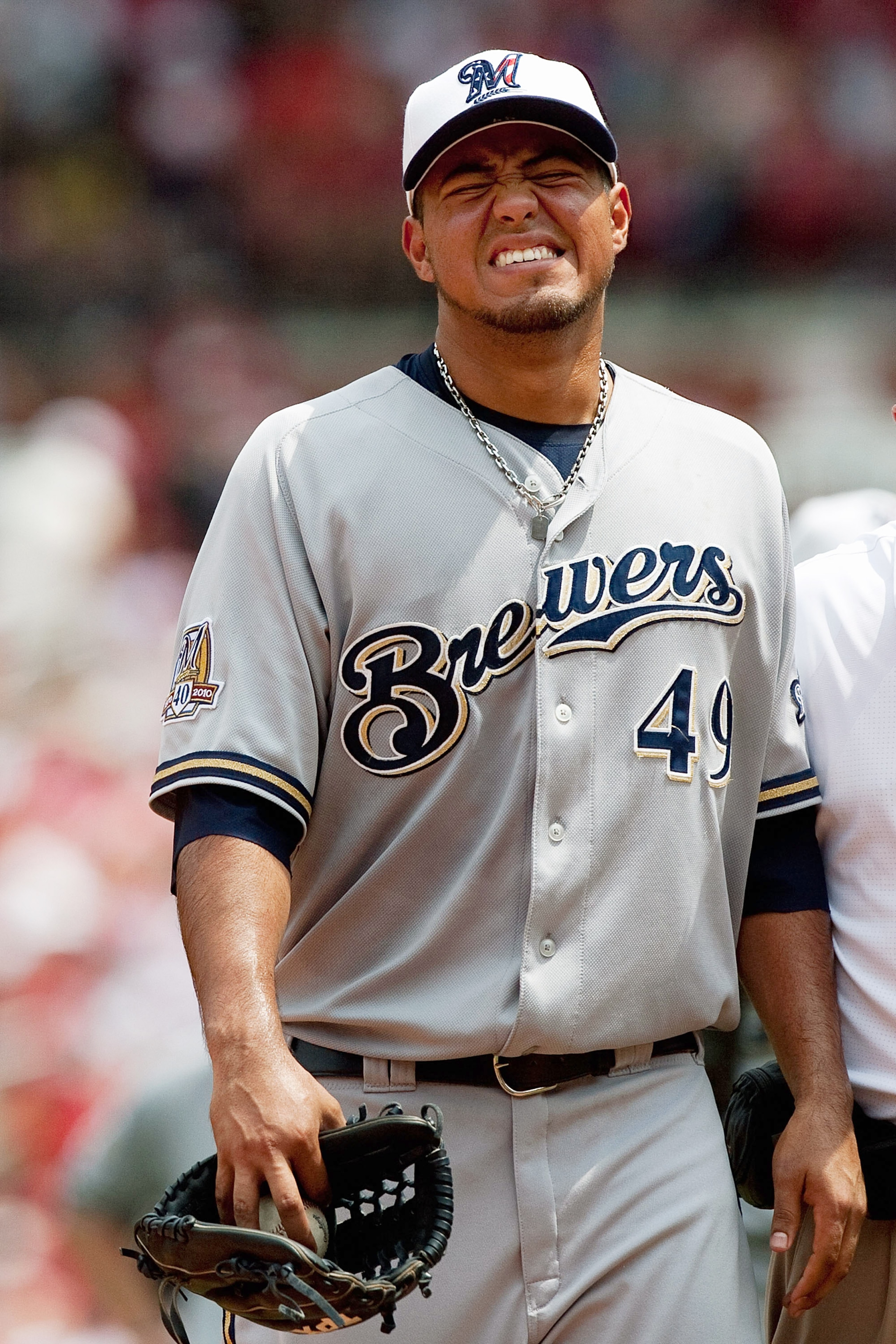 ST. LOUIS - JULY 4: Stating pitcher Yovani Gallardo #49 of the Milwaukee Brewers leaves the game with an unknown injury against the St. Louis Cardinals at Busch Stadium on July 4, 2010 in St. Louis, Missouri.  The Cardinals beat the Brewers 7-1.  (Photo b