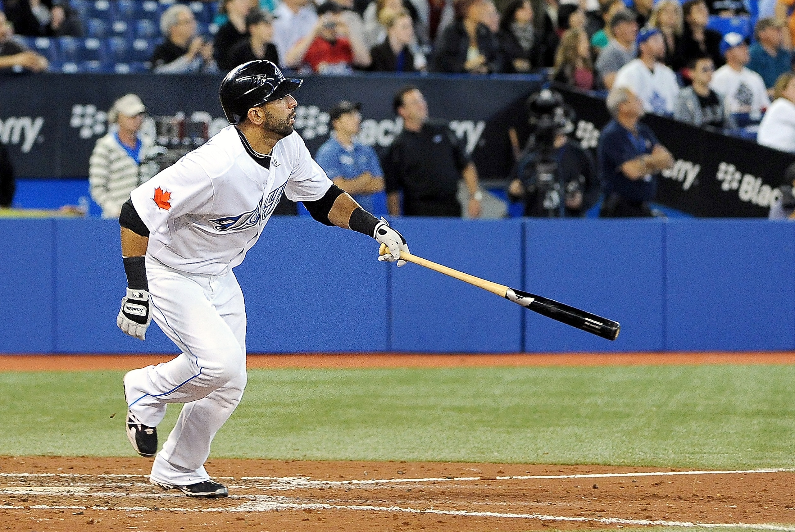 TORONTO, ON - SEPTEMBER 22: Jose Bautista #19 of the Toronto Blue Jays watches the ball as he runs to 1st base after a hit against the Seattle Mariners on September 22, 2010 at the Rogers Centre in Toronto, Canada. (Photo by Matthew Manor/Getty Images)