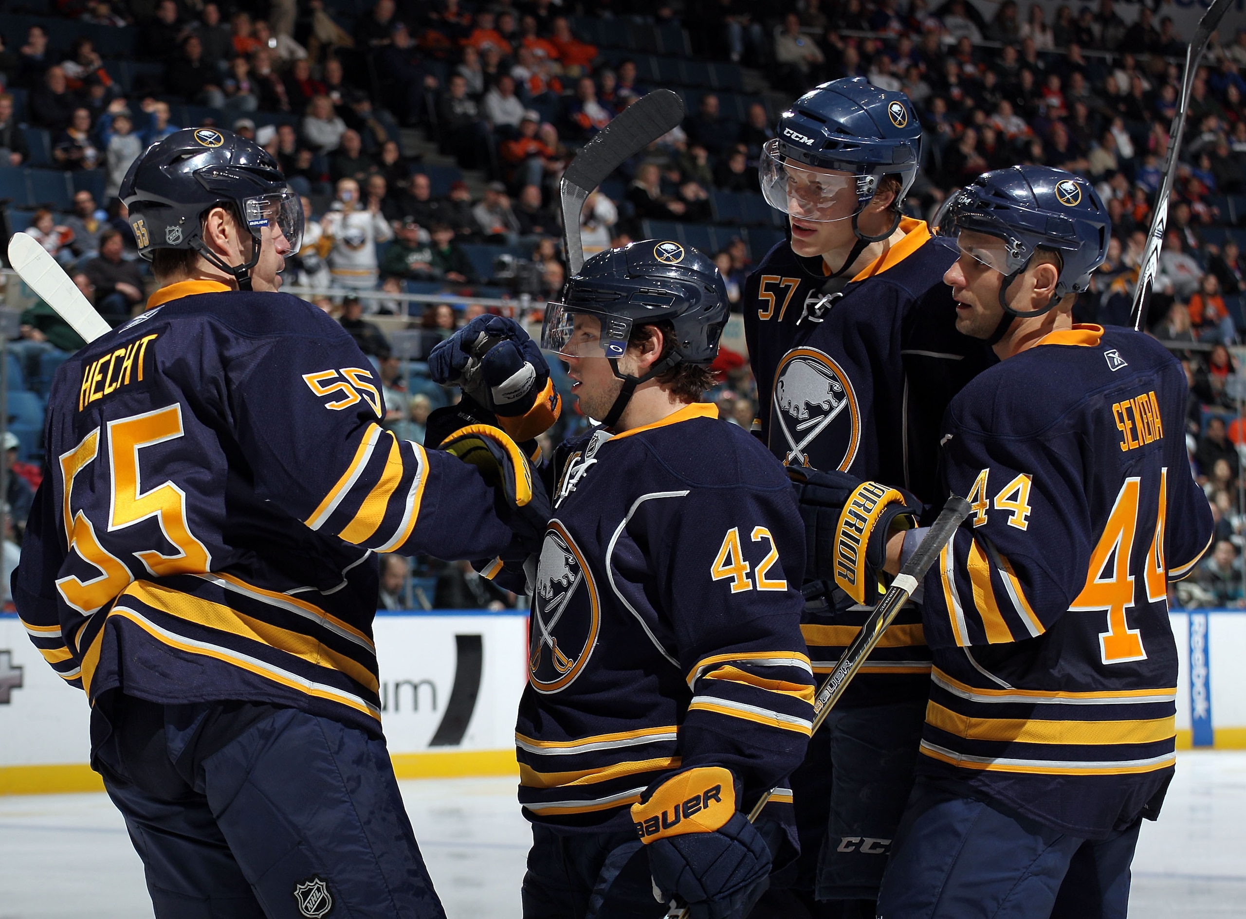 UNIONDALE, NY - JANUARY 23:  Nathan Gerbe #42 (C) of the Buffalo Sabres scores a third period goal against the New York Islanders at the Nassau Coliseum on January 23, 2011 in Uniondale, New York. The Sabres defeated the Islanders 5-3. (Photo by Bruce Ben