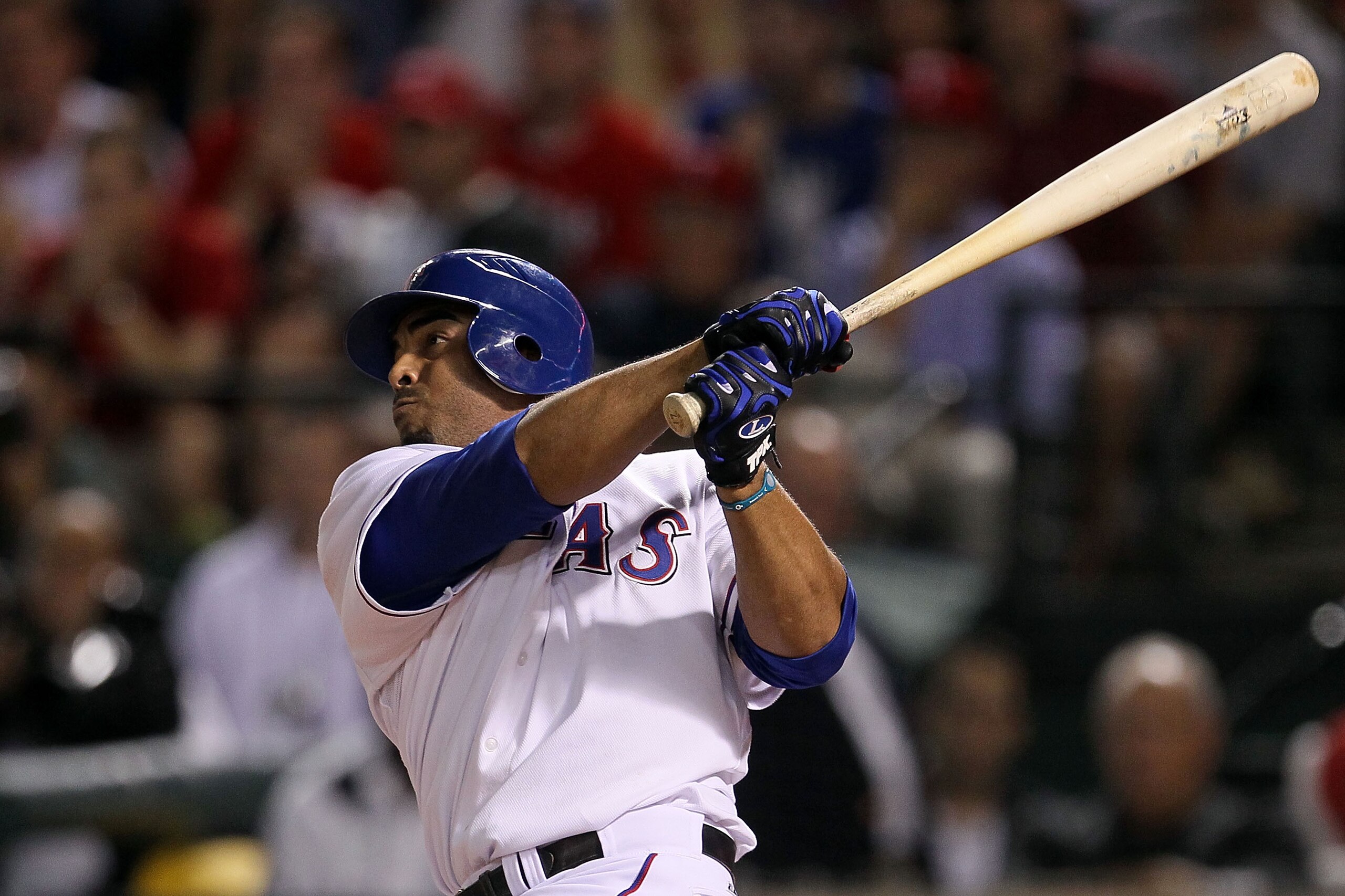 ARLINGTON, TX - OCTOBER 22:  Nelson Cruz #17 of the Texas Rangers hits a 2-run home run in the bottom of the fifth inning against the New York Yankees in Game Six of the ALCS during the 2010 MLB Playoffs at Rangers Ballpark in Arlington on October 22, 201